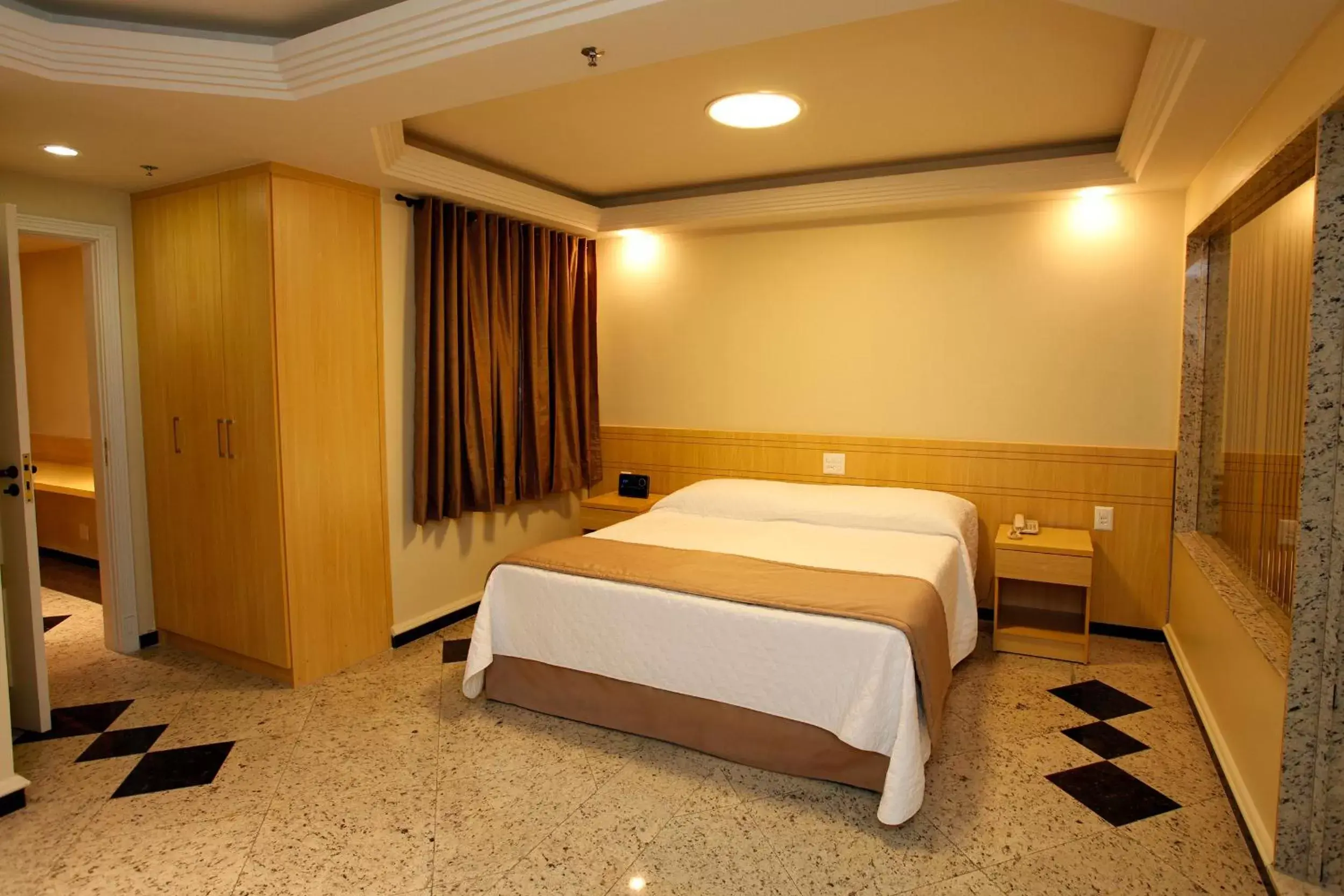 Photo of the whole room, Bed in Elegance Praia Hotel Photo of the whole room, Bed in Elegance Praia Hotel