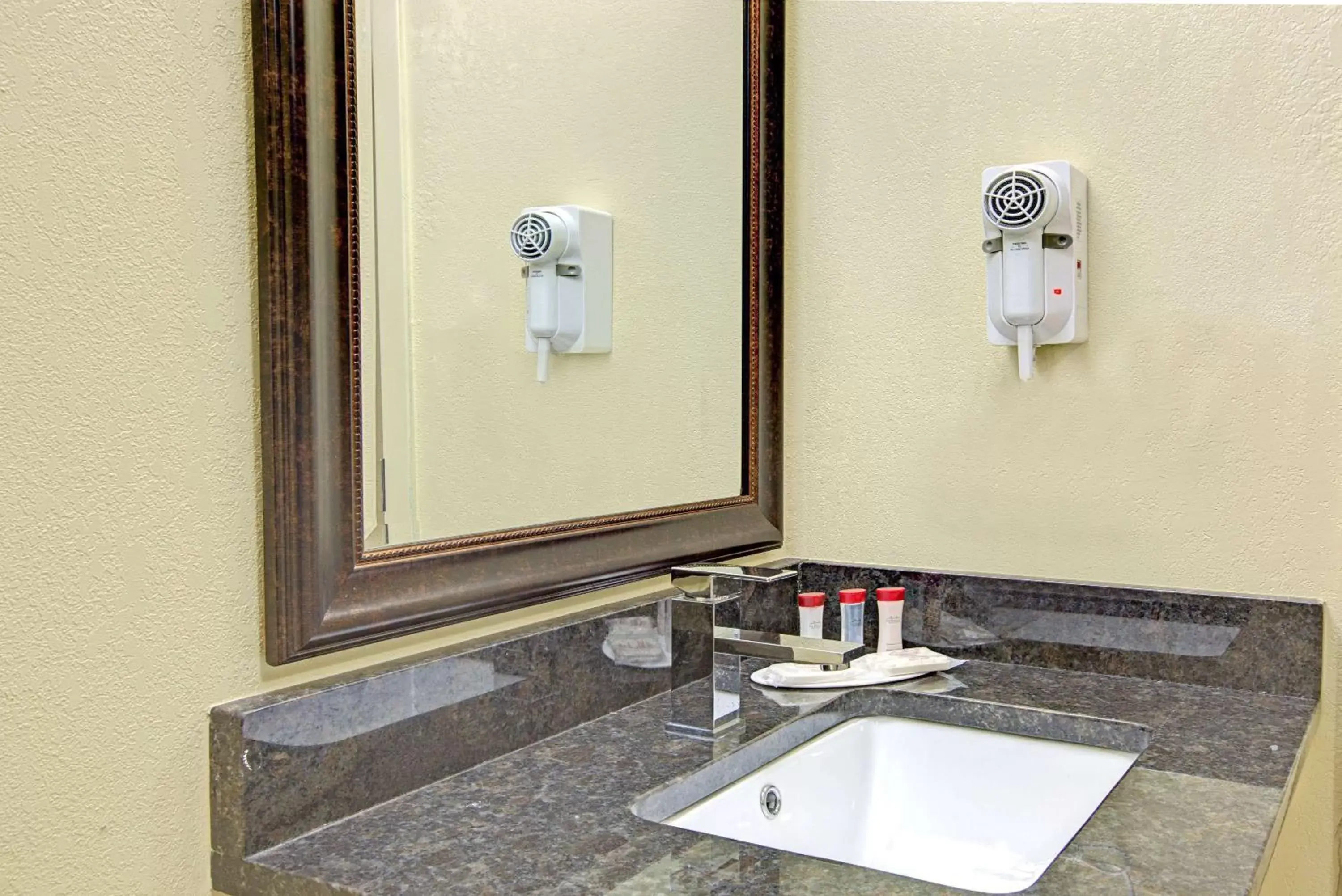 Photo of the whole room, Bathroom in Ramada Plaza by Wyndham Charlotte South End Airport