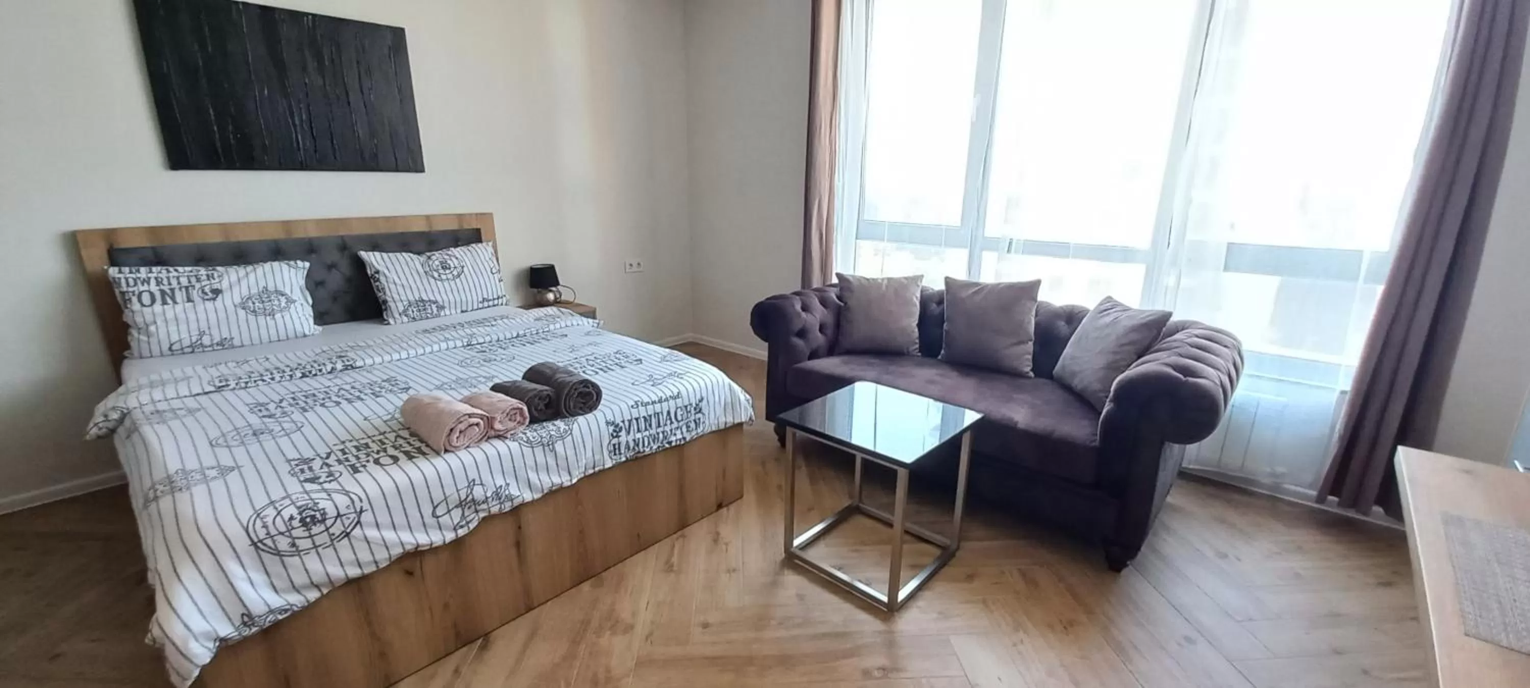 Bed in WOW Apartments