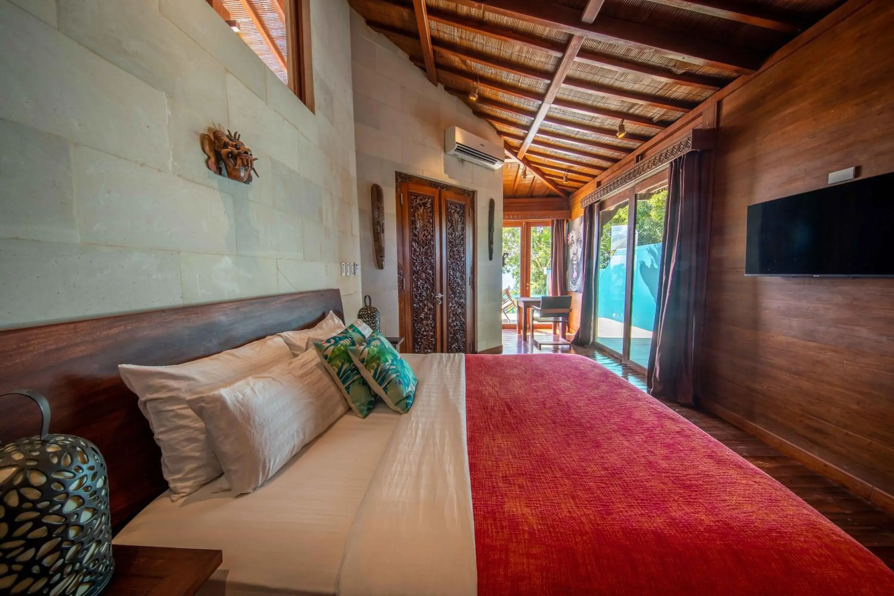 Bed in Karuna El Nido Villas