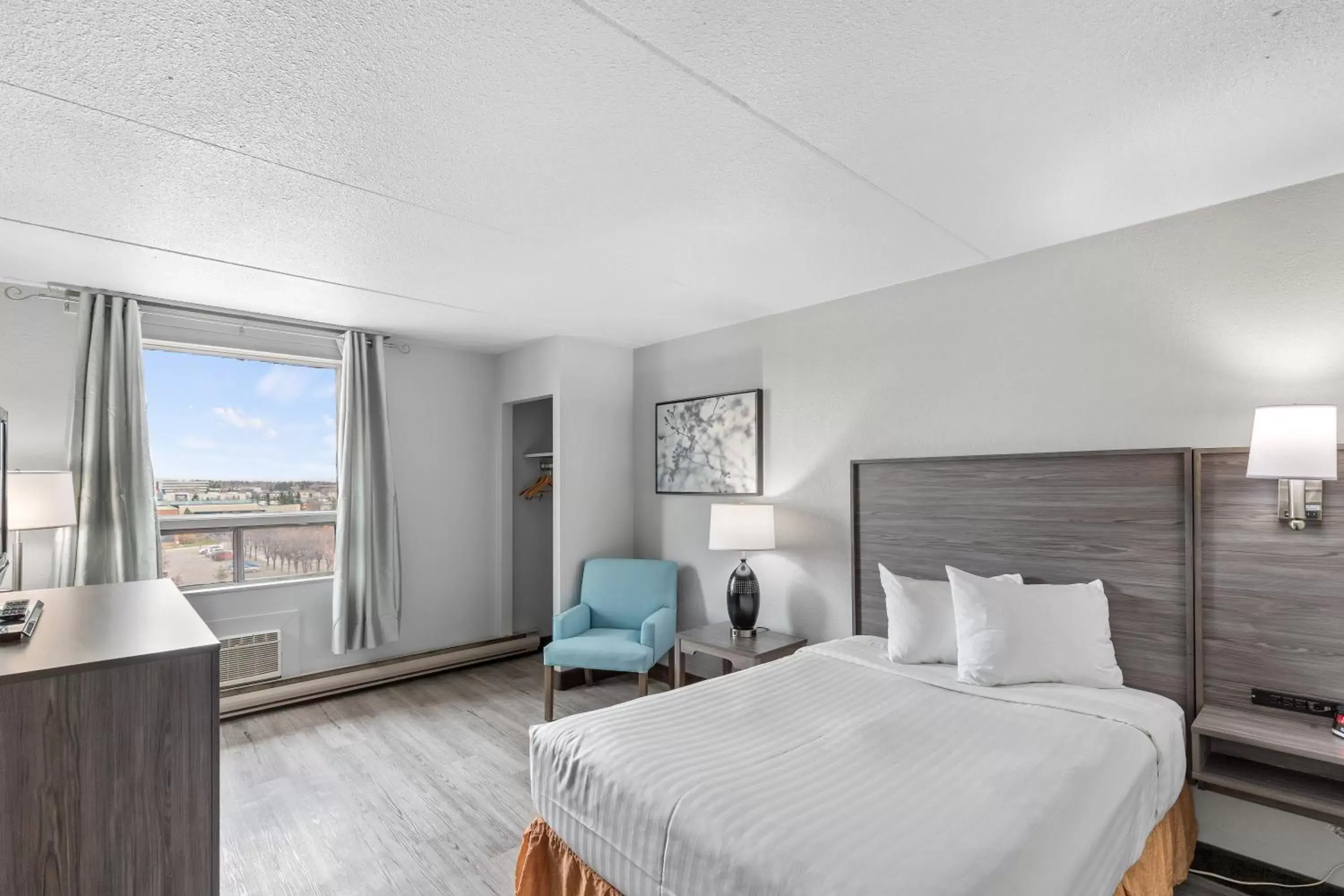 Photo of the whole room in Emerald Hotel & Suites Calgary Airport