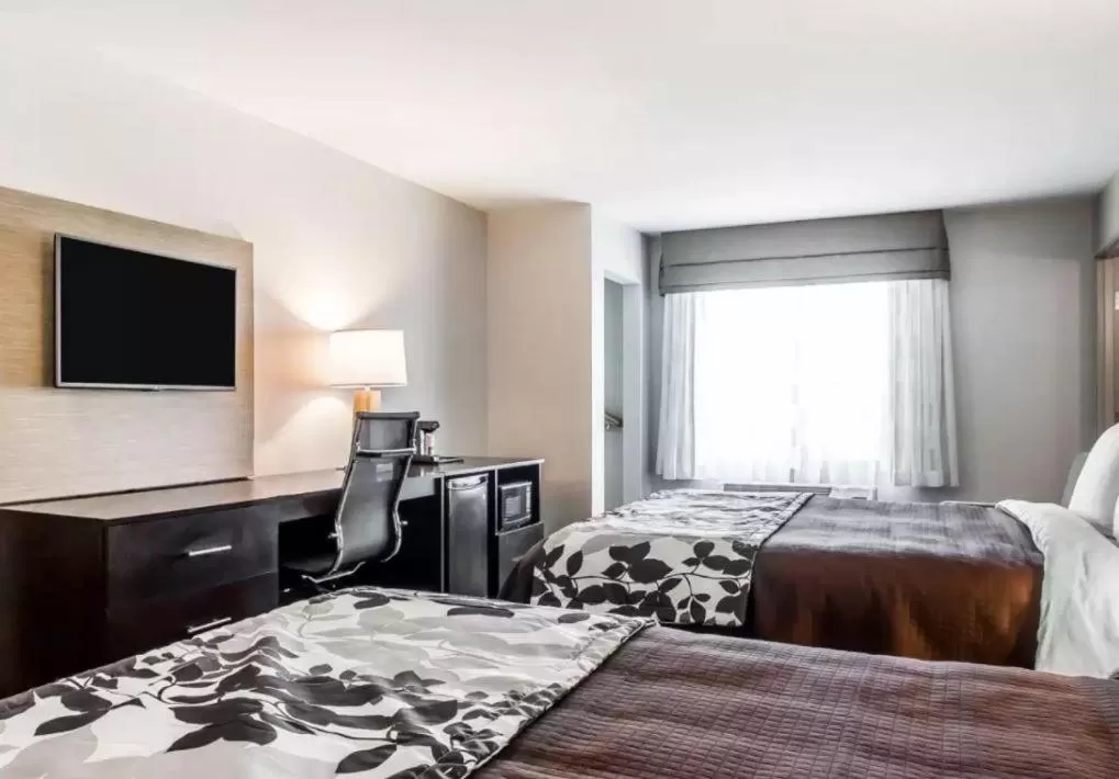 Bed in Sleep Inn & Suites Hannibal West