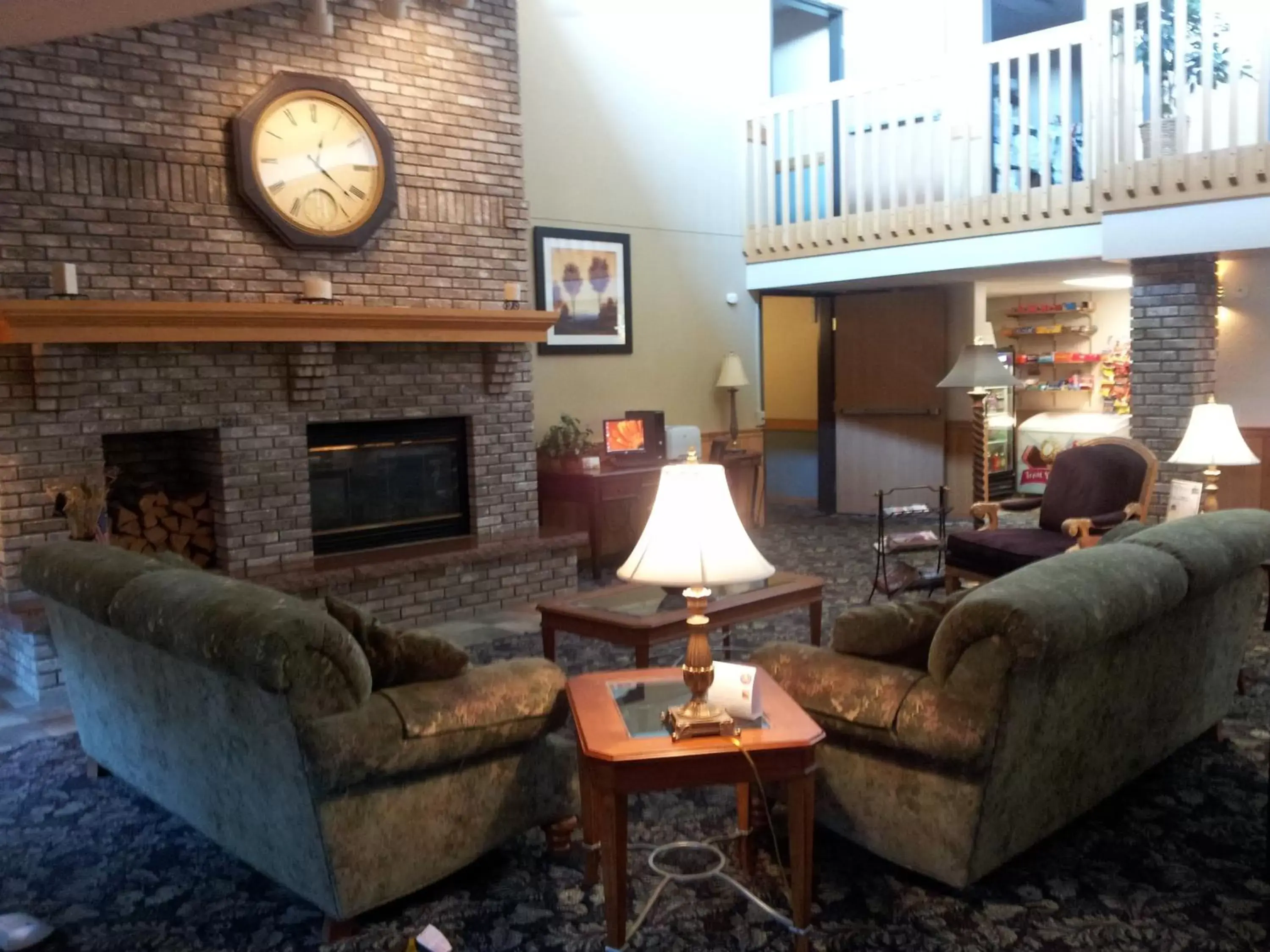 Communal lounge/ TV room, Seating Area in Cobblestone Hotel & Suites - Wisconsin Rapids