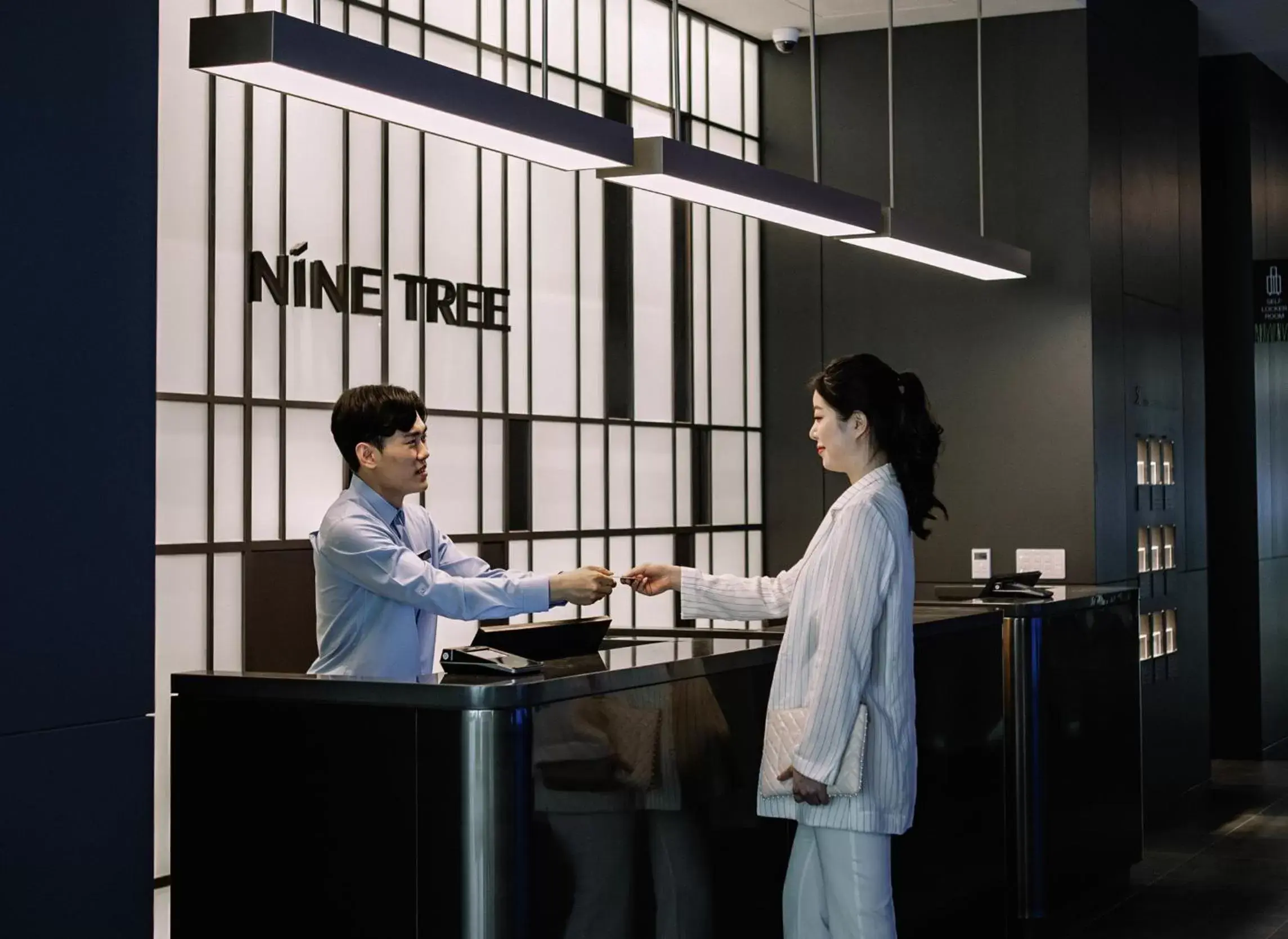 Staff in Nine Tree Premier Hotel Seoul Pangyo
