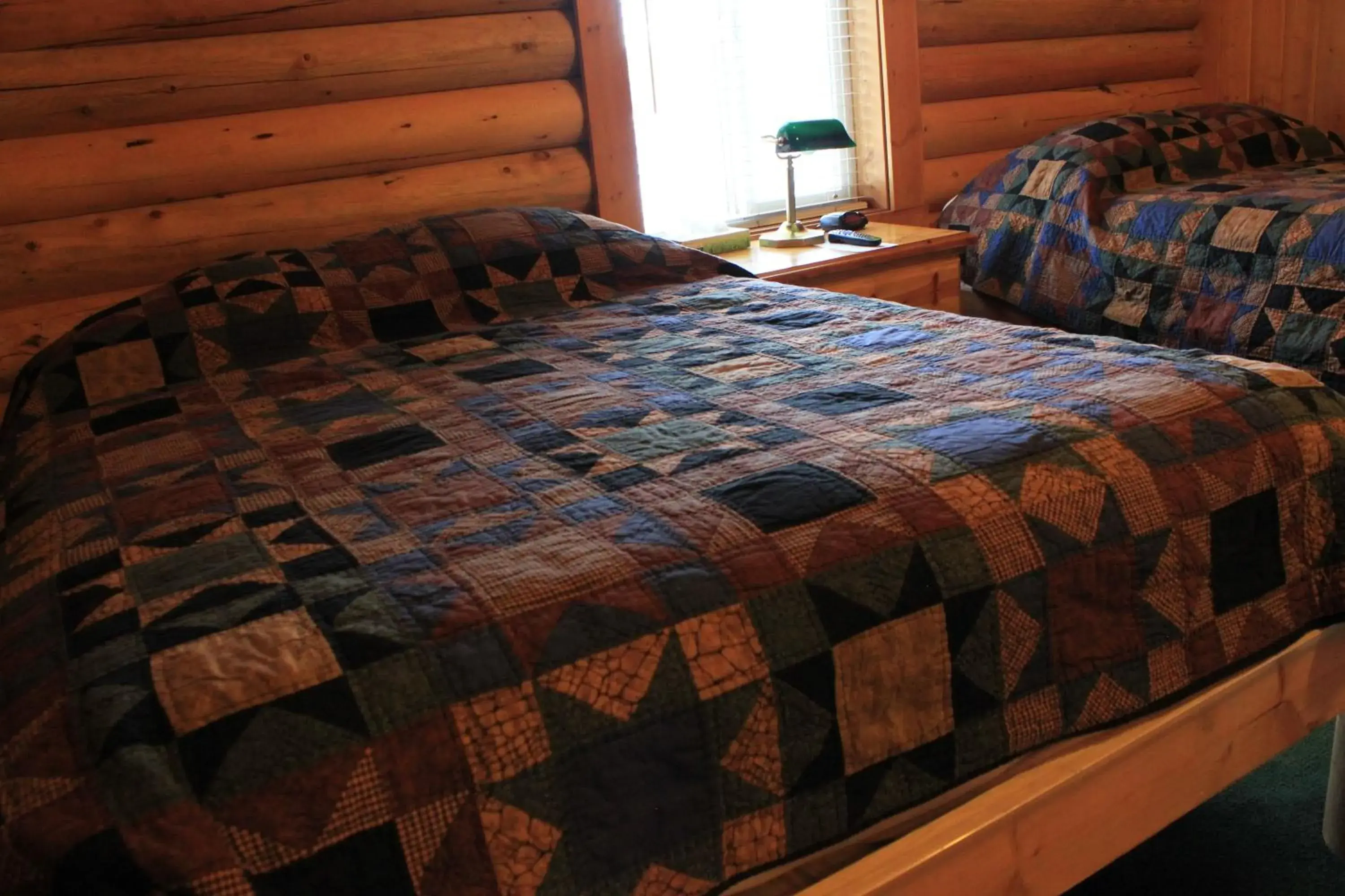 Bed in Teton Valley Cabins