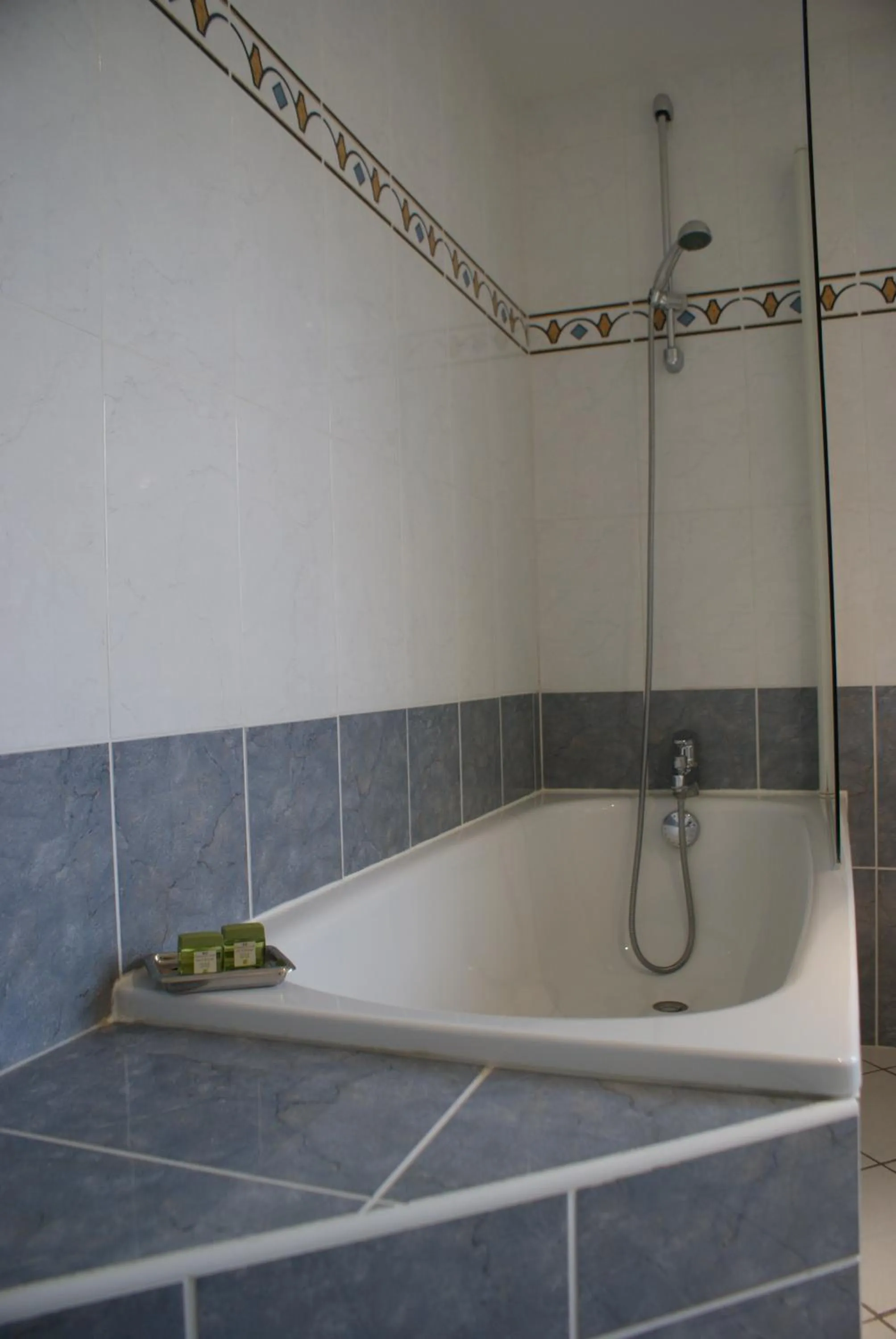 Bathroom in Logis Hotels Le Champalud Restaurant La Citadelle