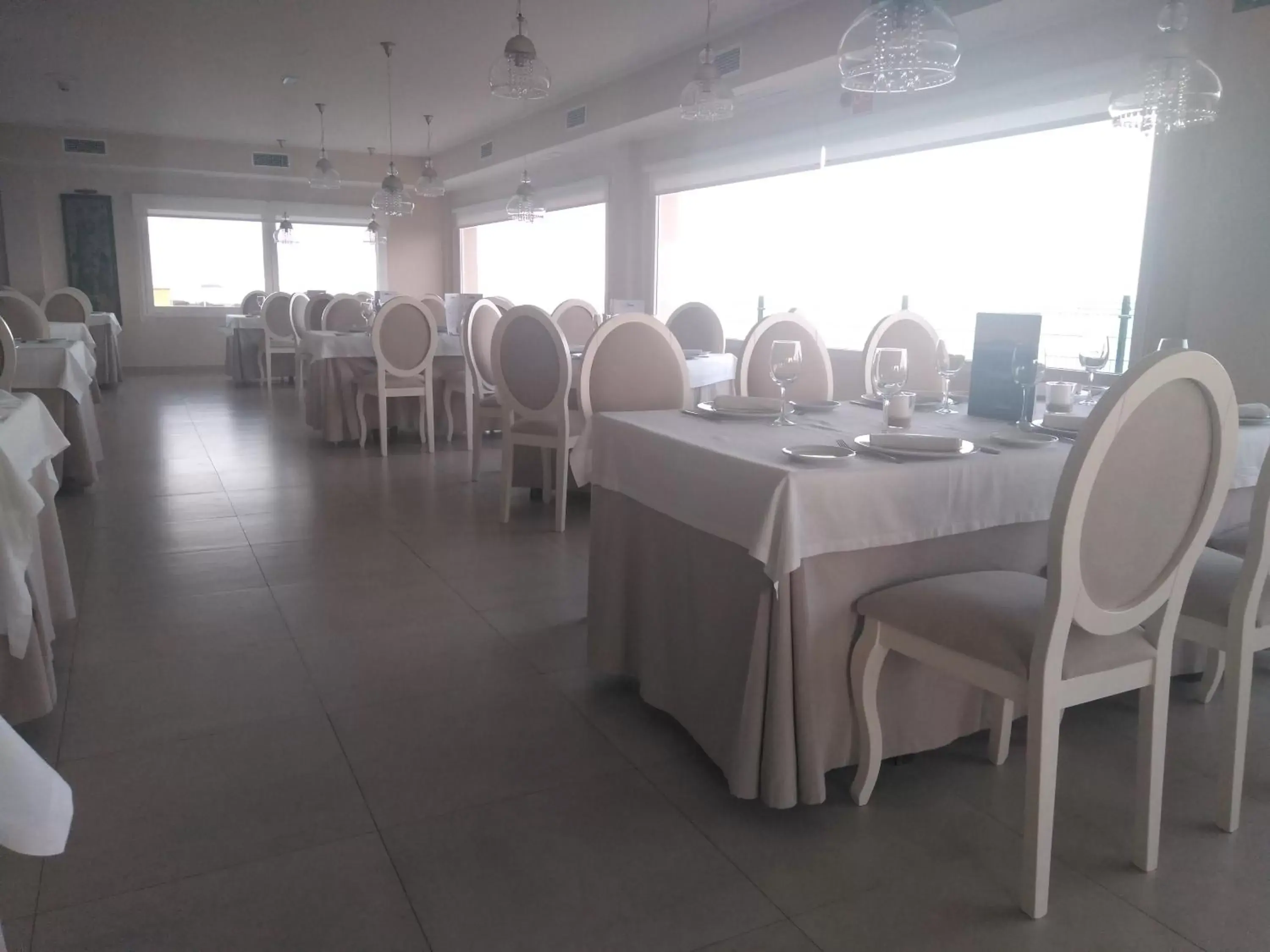 Communal lounge/ TV room, Restaurant/Places to Eat in Punta Carnero Hostal singular