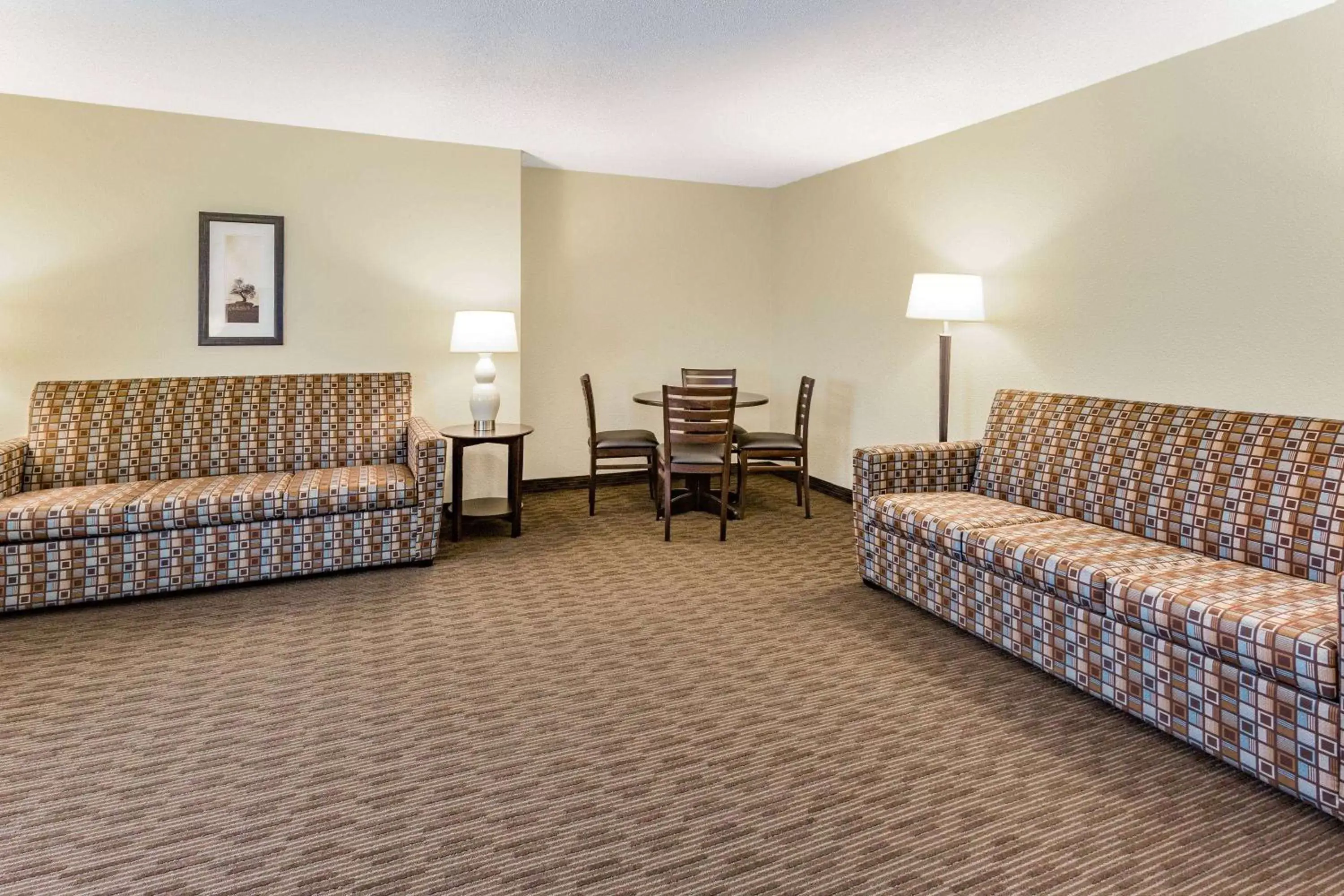 Living room, Seating Area in AmericInn by Wyndham Sleepy Eye