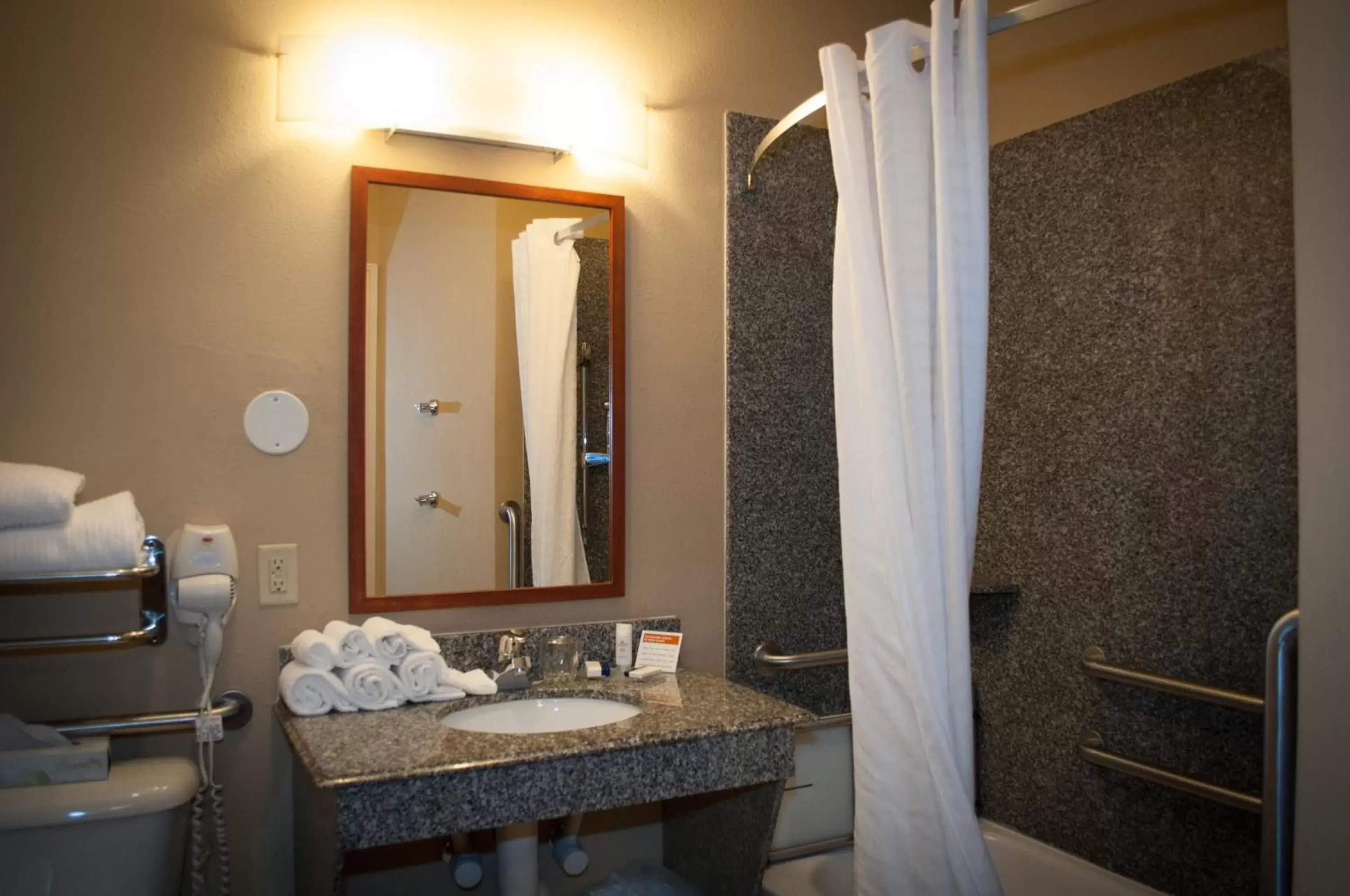 Bathroom in Candlewood Suites New Iberia, an IHG Hotel