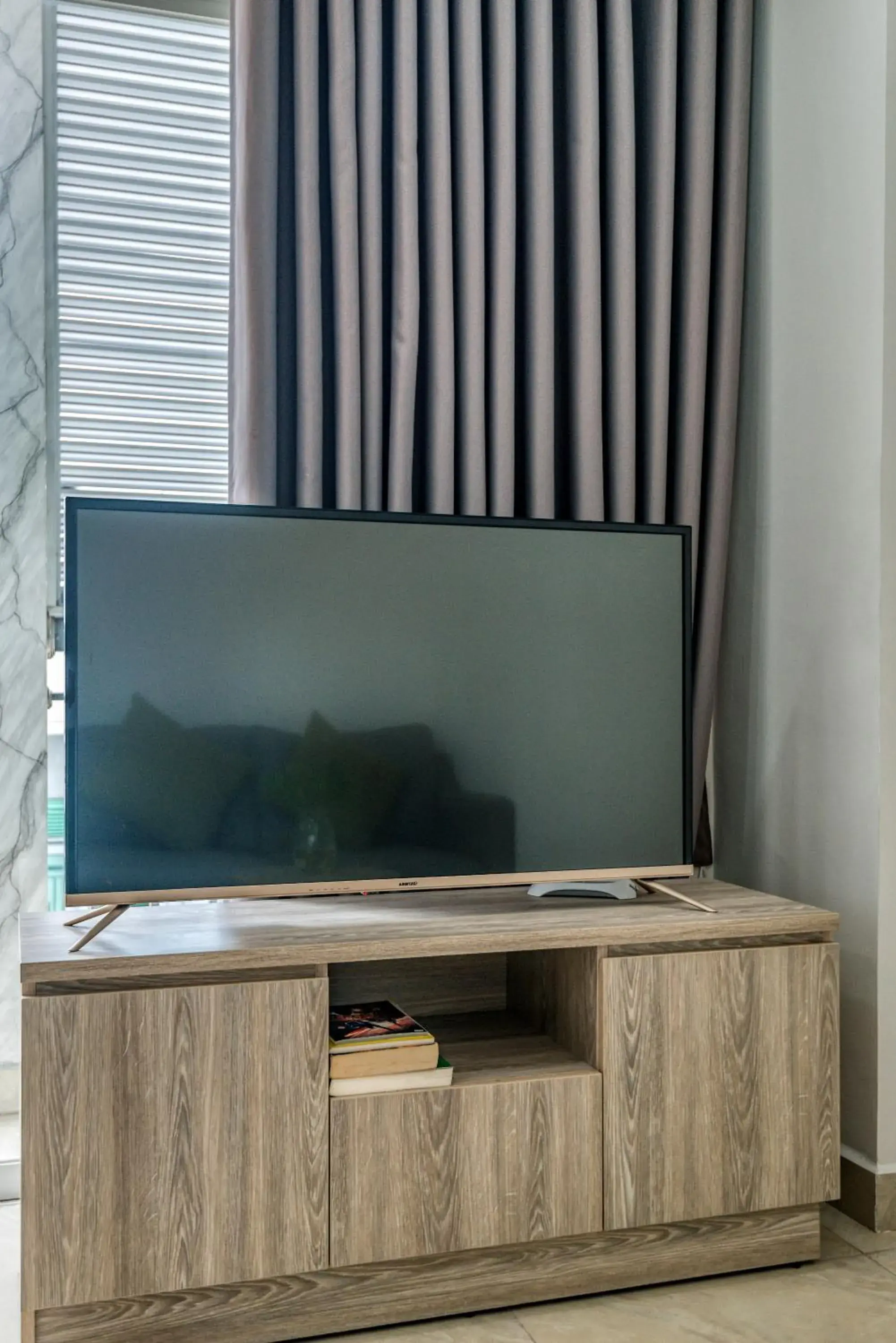 TV and multimedia, TV/Entertainment Center in Cherry Hotel and Apartment