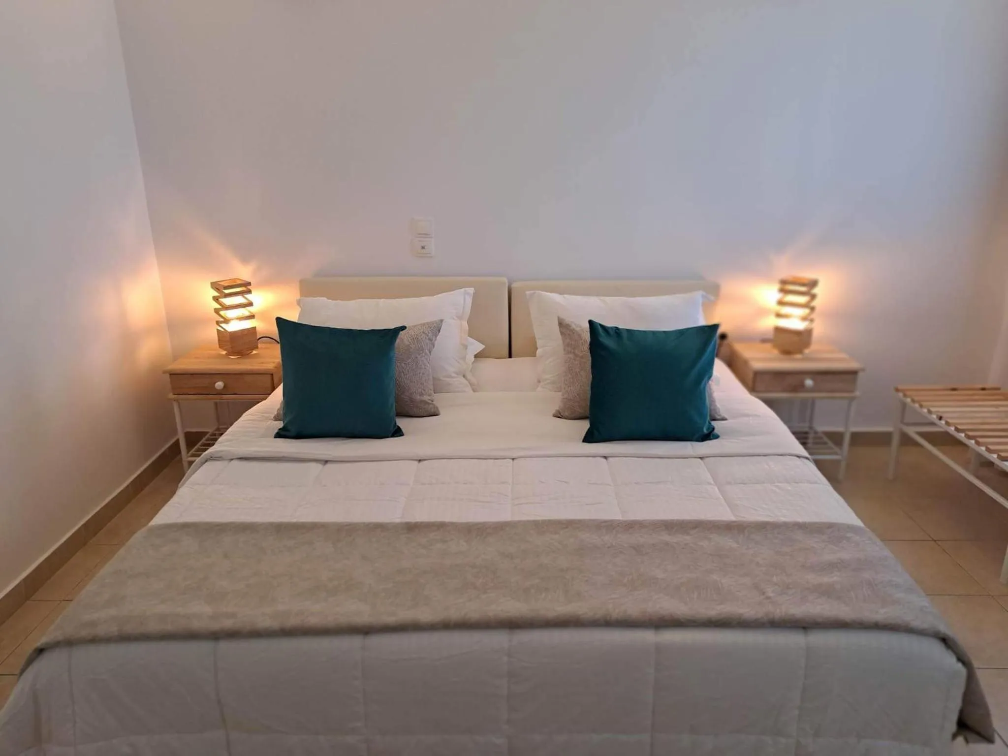 Bed in Amerisa Suites & Villa