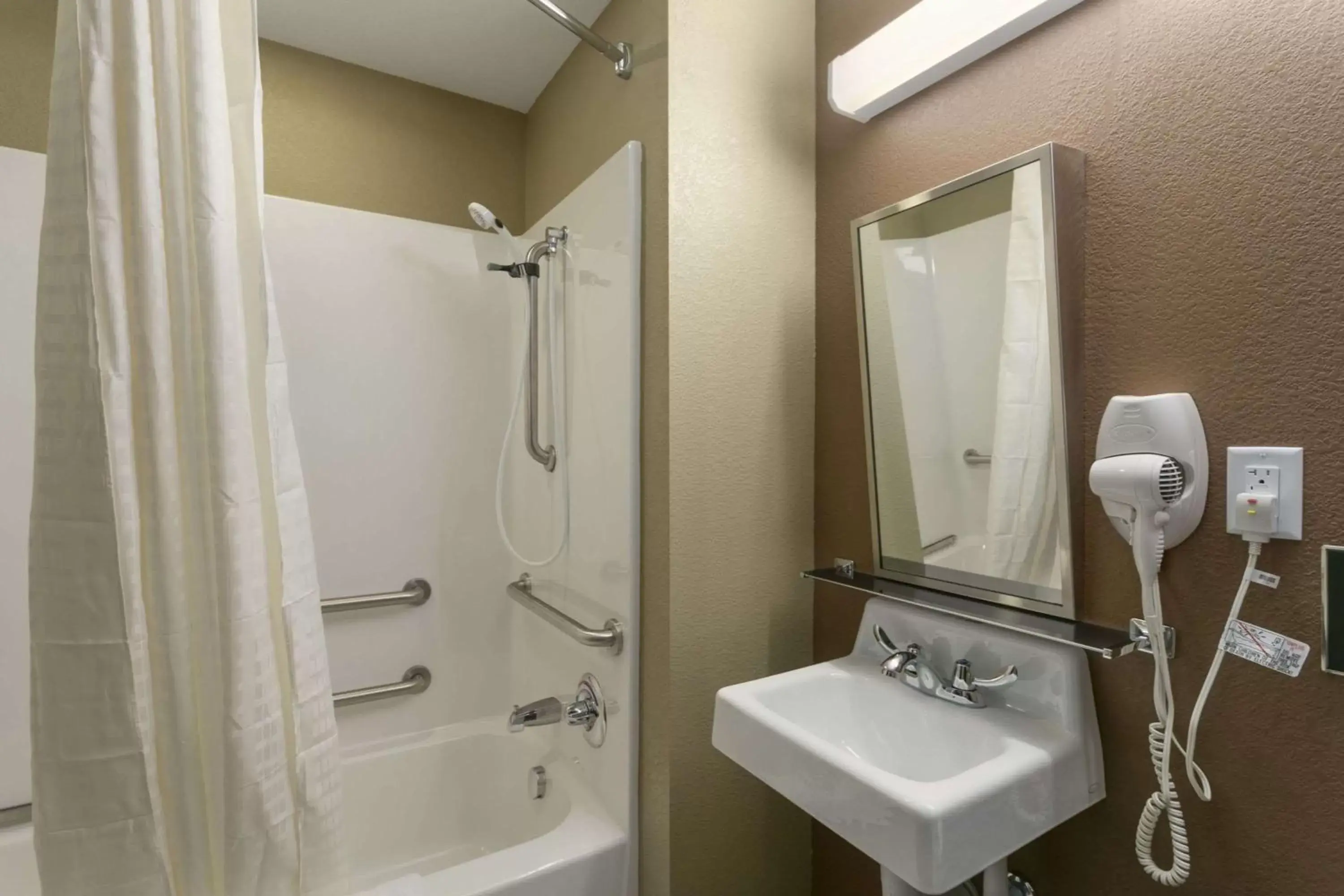 Bathroom in Microtel Inn & Suites by Wyndham Minot