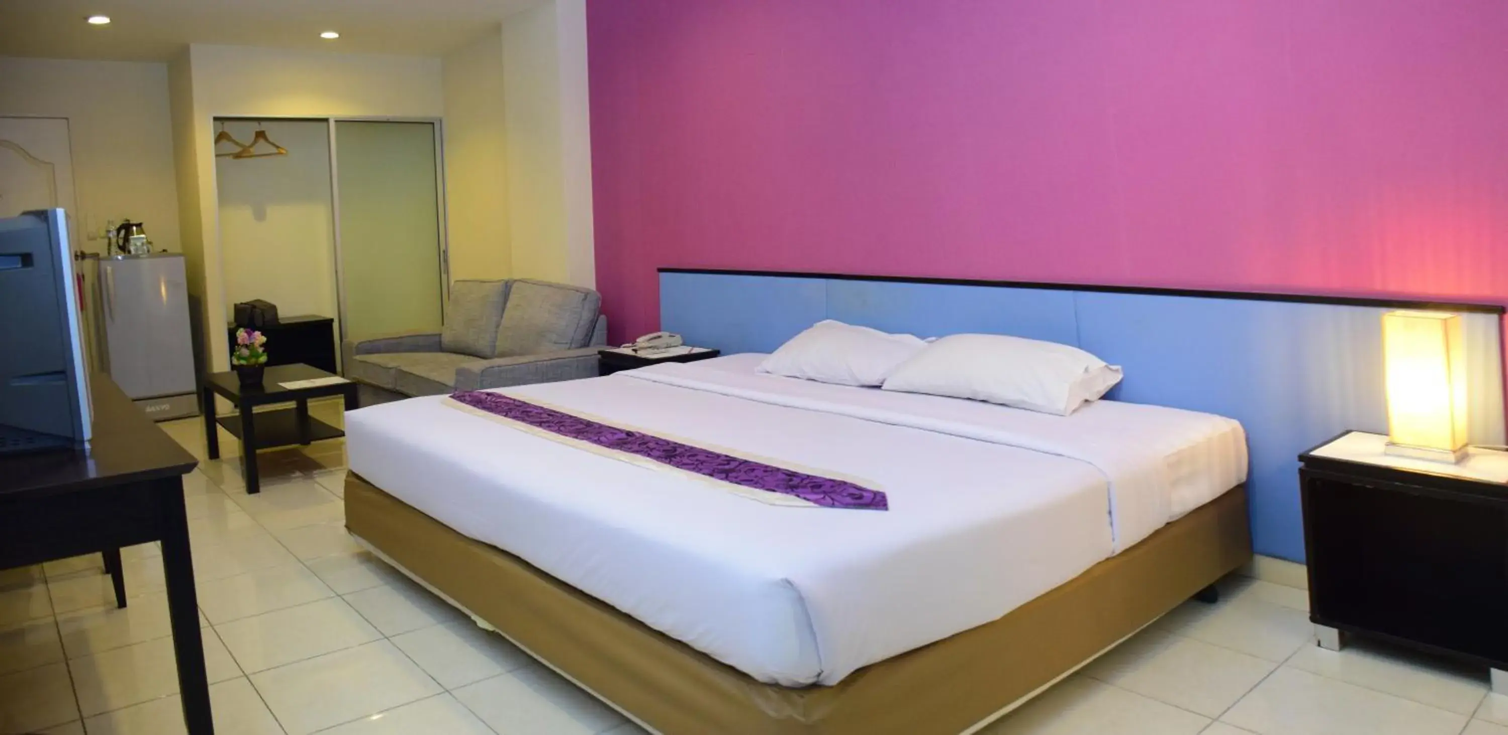Photo of the whole room, Bed in The Color Living Hotel