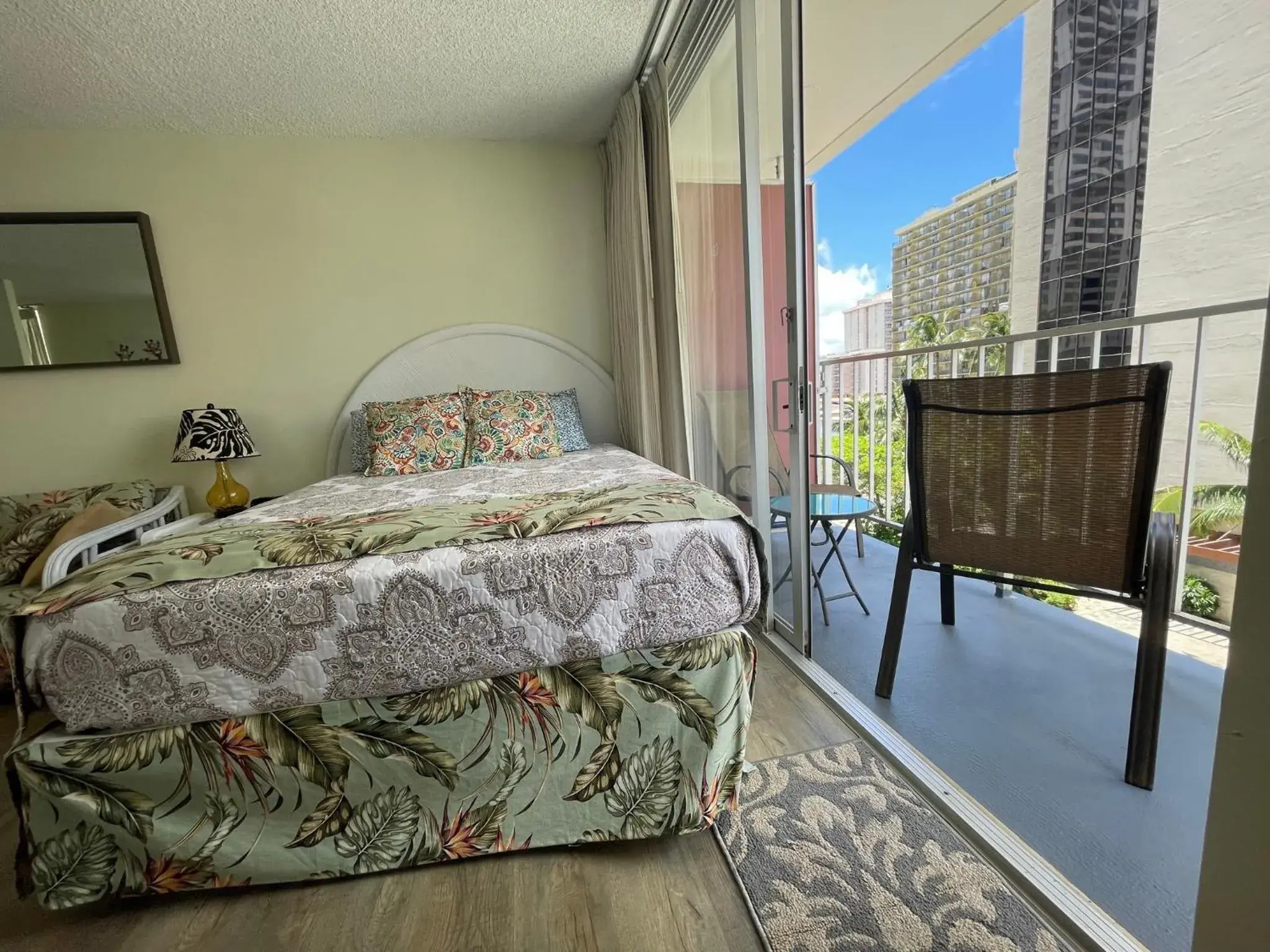 Bed in Tropical Studios at Marine Surf Waikiki - FREE PARKING - BEST LOCATION - FULL KITCHEN - SWIMMING POOL