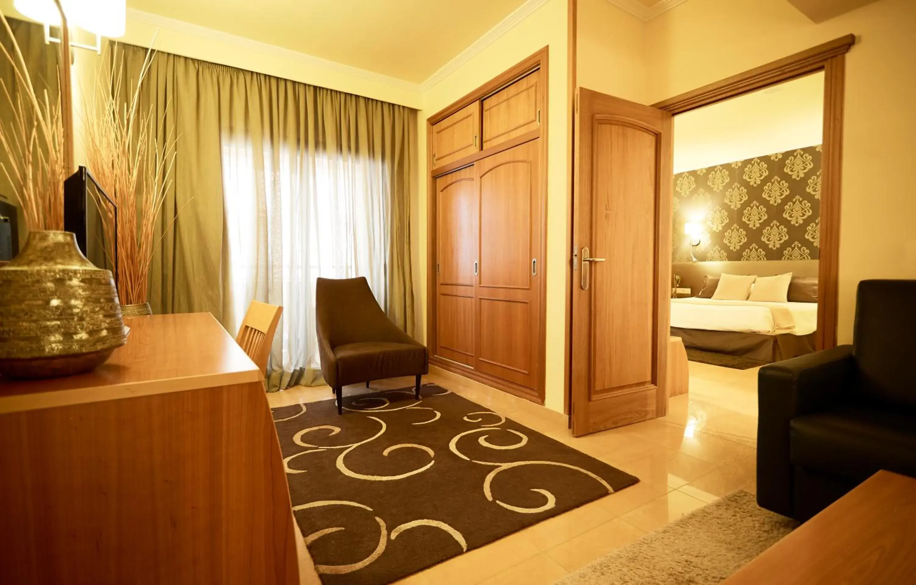 Communal lounge/ TV room, Seating Area in Invisa Hotel La Cala