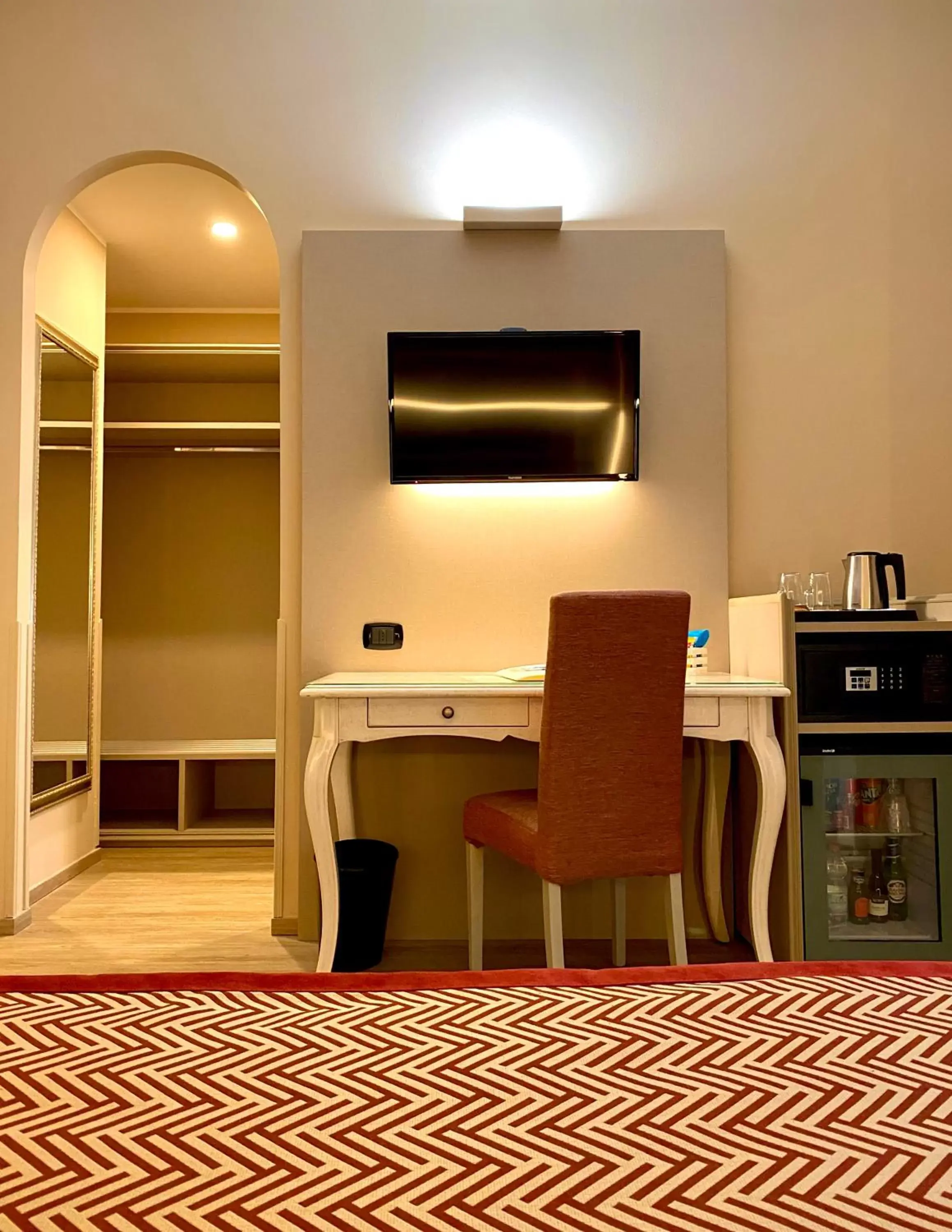 TV and multimedia, TV/Entertainment Center in Hotel Villa Malpensa