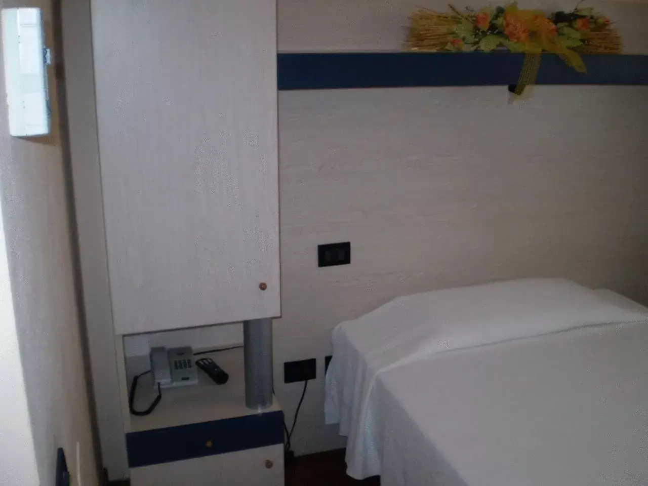 Bed in Albergo Grappolo D'oro