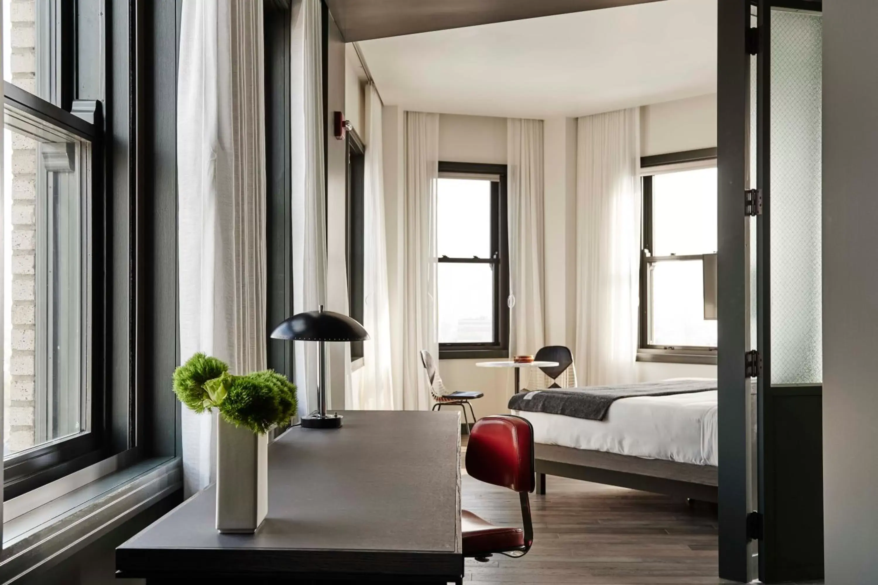 Bed, Seating Area in The Robey, Chicago, a Member of Design Hotels