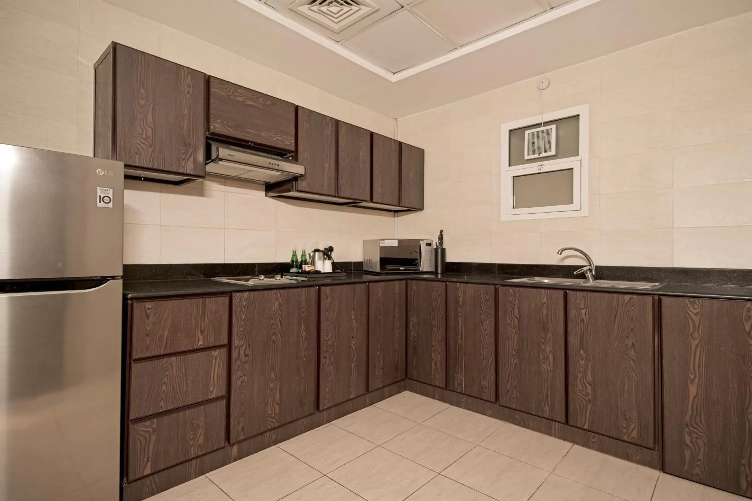 Kitchen or kitchenette, Kitchen/Kitchenette in Action Hotel Ras Al Khaimah