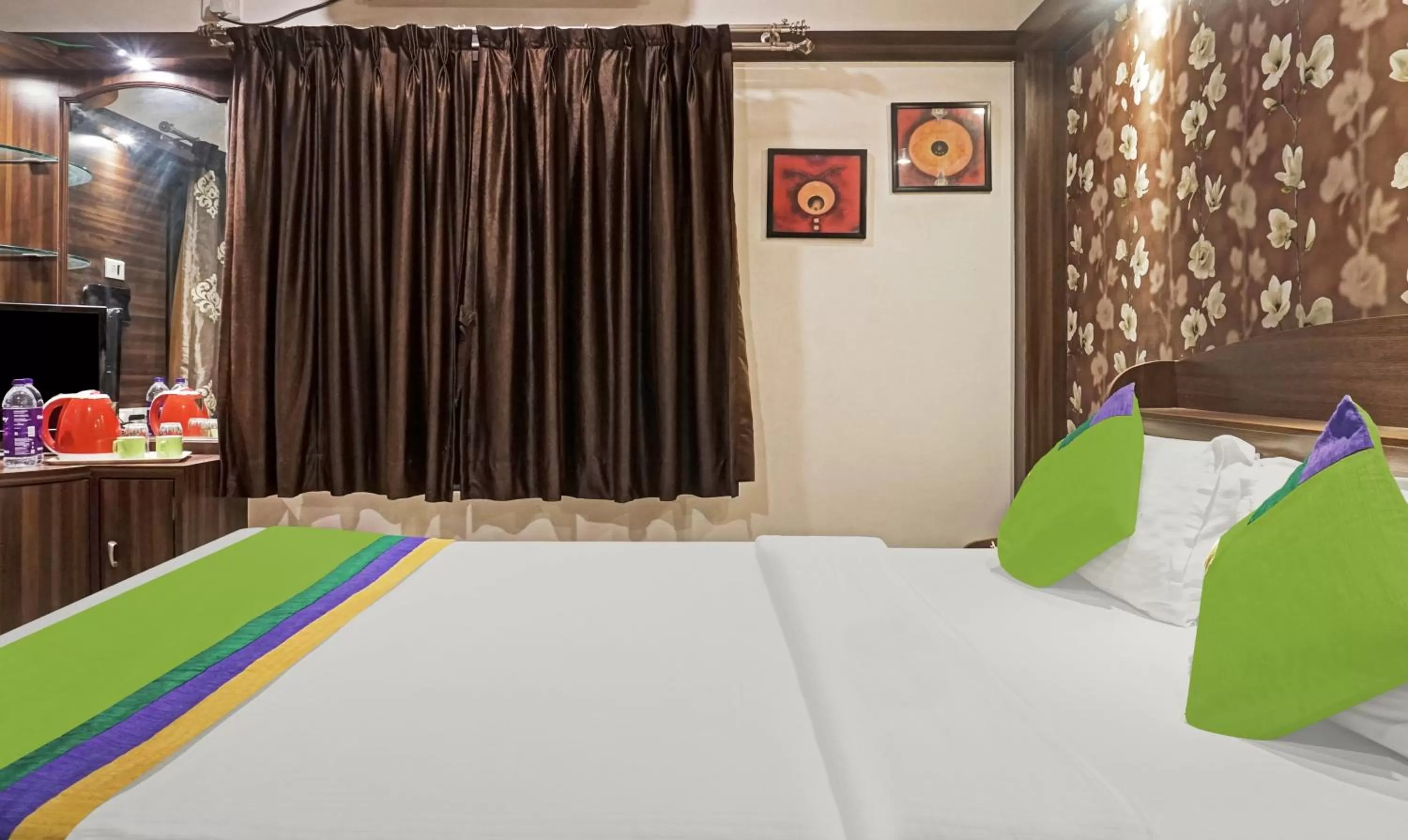 Bedroom, Bed in Treebo Excellent Home