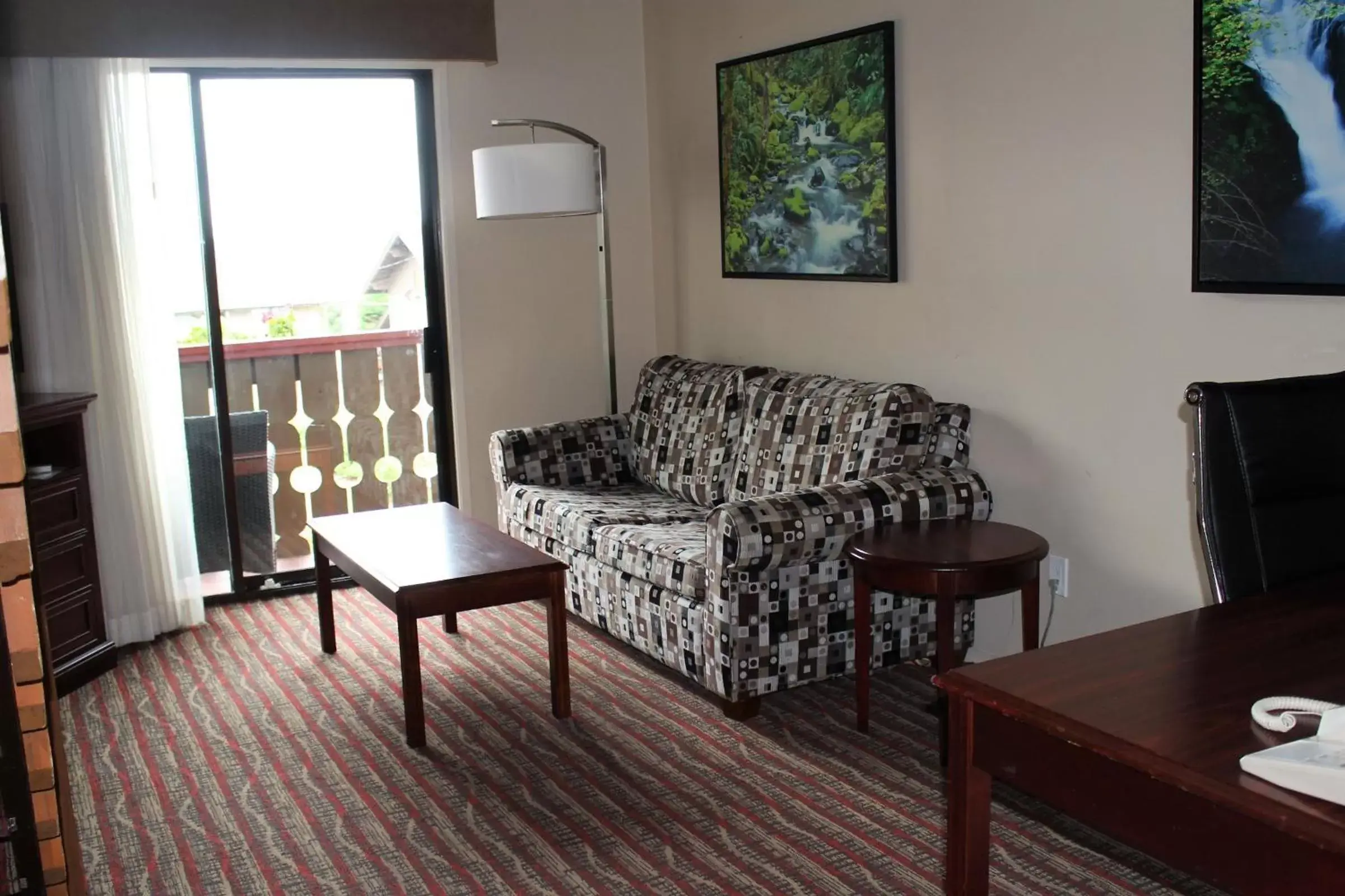 Living room, Seating Area in Ramada by Wyndham Campbell River