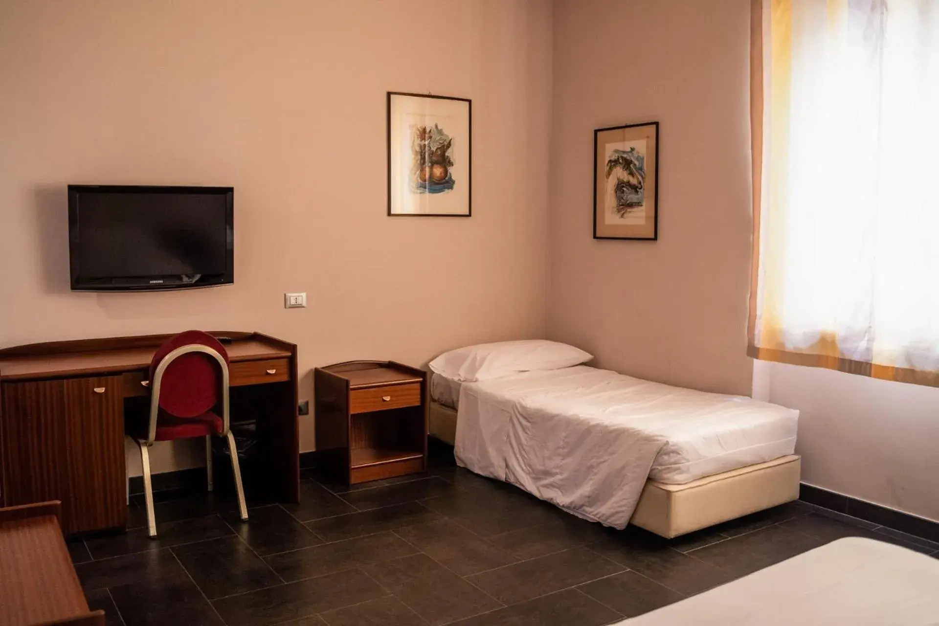 Bed in Hotel Mediterraneo