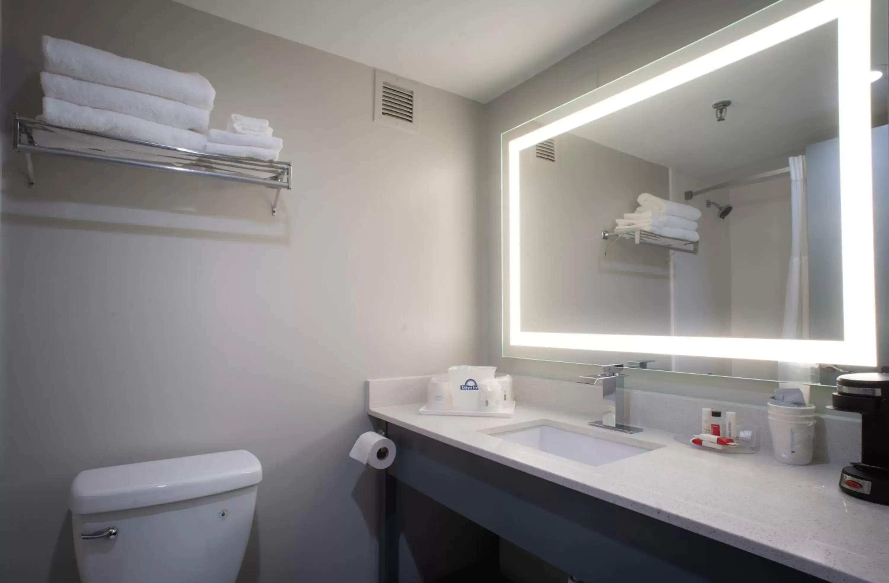 Bathroom in Days Hotel by Wyndham East Brunswick Conference Center