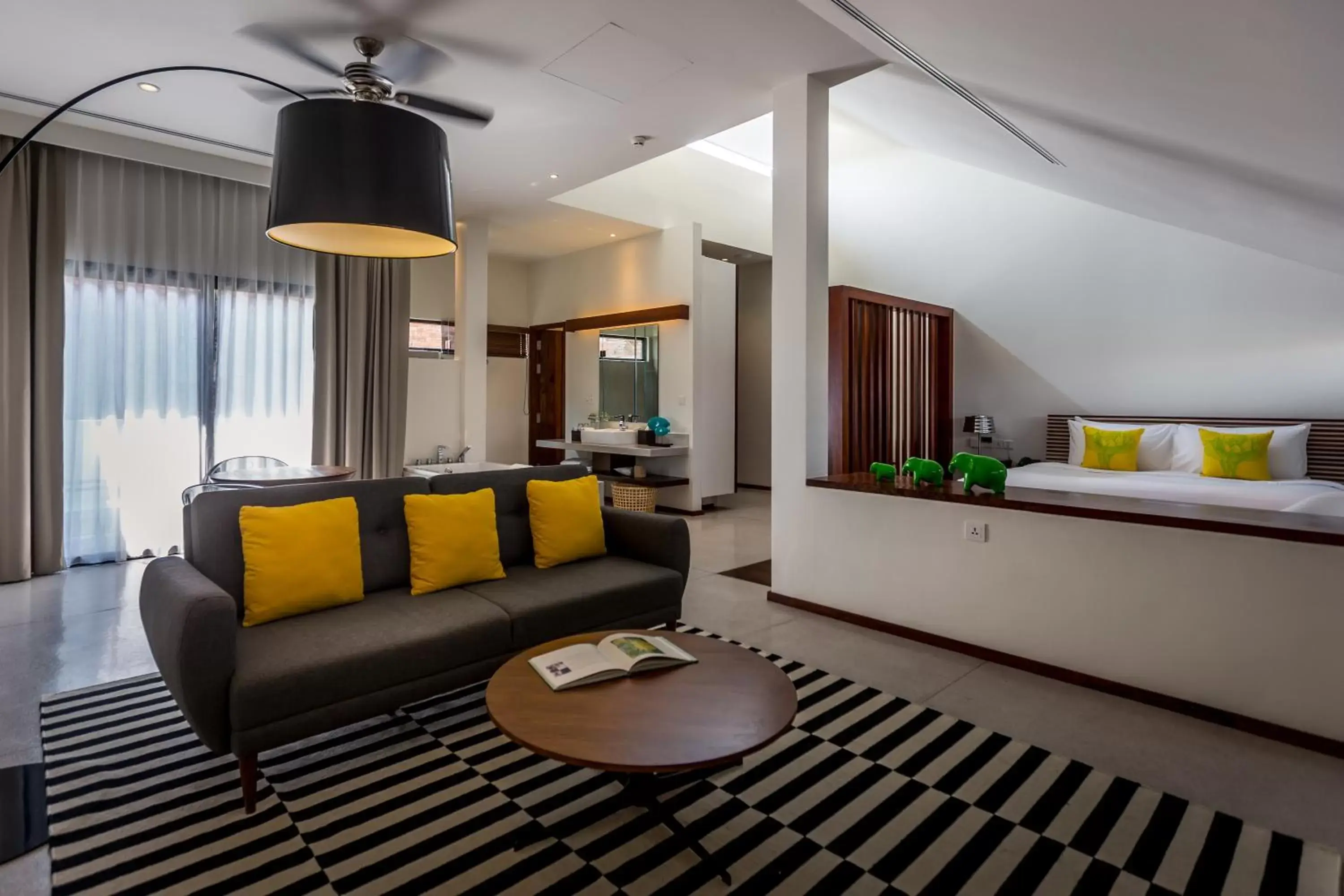 Bed, Seating Area in The Aviary Hotel