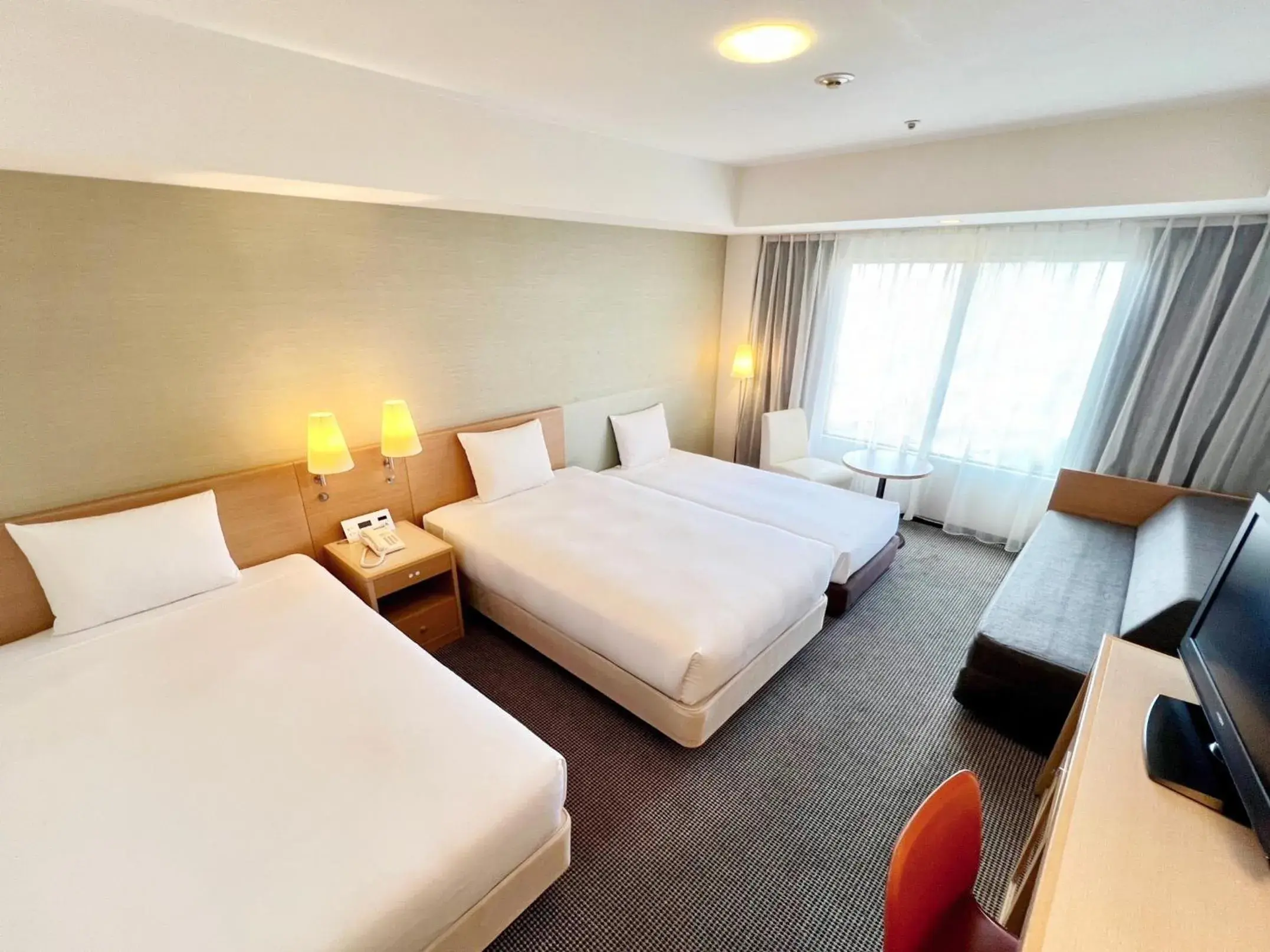 Photo of the whole room, Bed in Okinawa Harborview Hotel