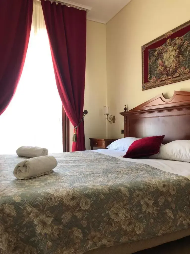 Bed in D'Angelo Palace Hotel