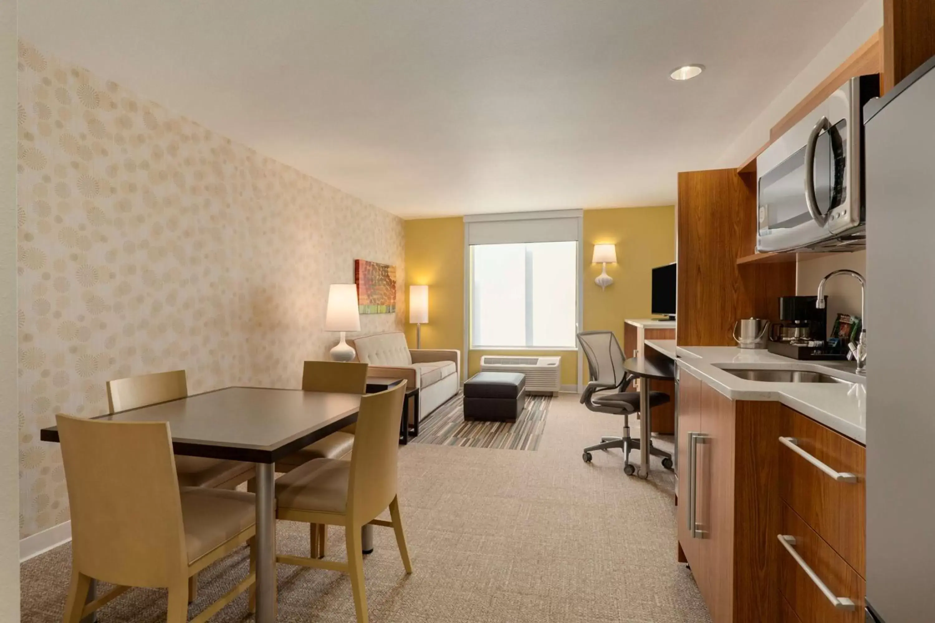 Bed, Kitchen/Kitchenette in Home2 Suites by Hilton Denver West / Federal Center