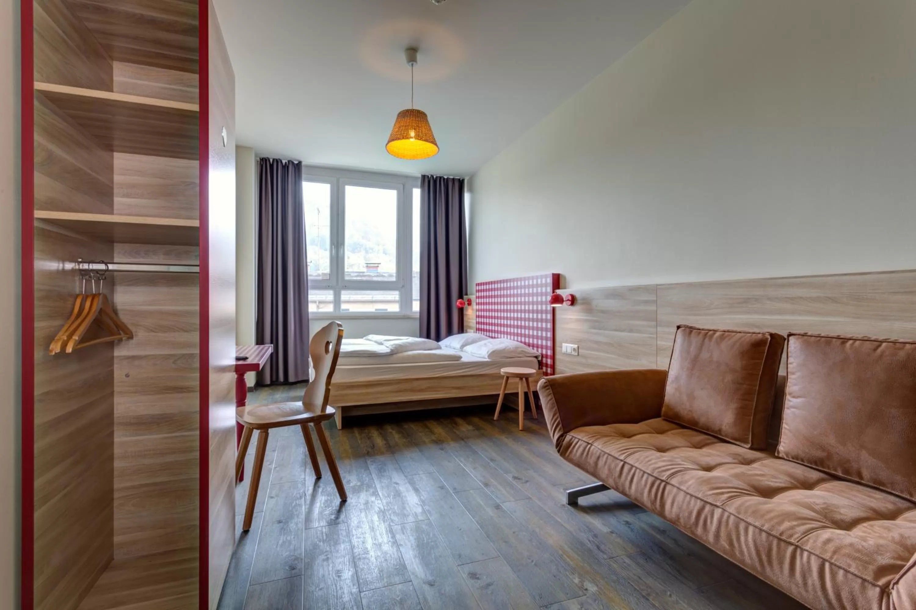 Photo of the whole room, Bed in MEININGER Hotel Salzburg City Center