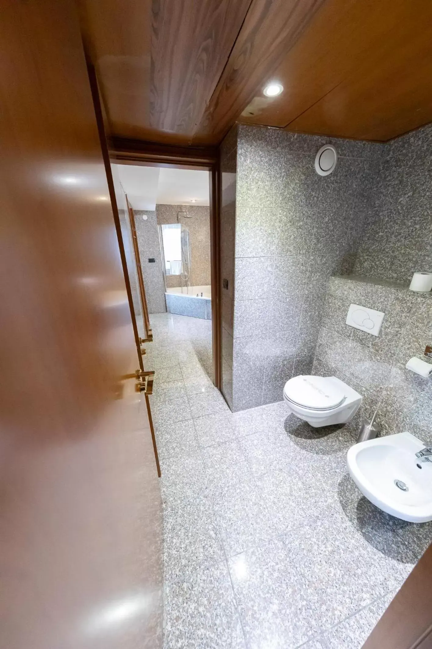 Shower, Bathroom in Goldstar Apartments & Suites