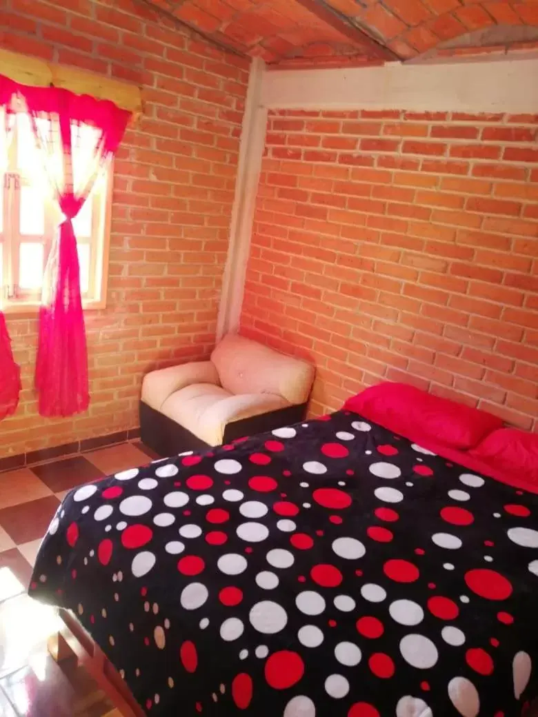 Bed in CABAÑAS TLAXCO LA LOMA
