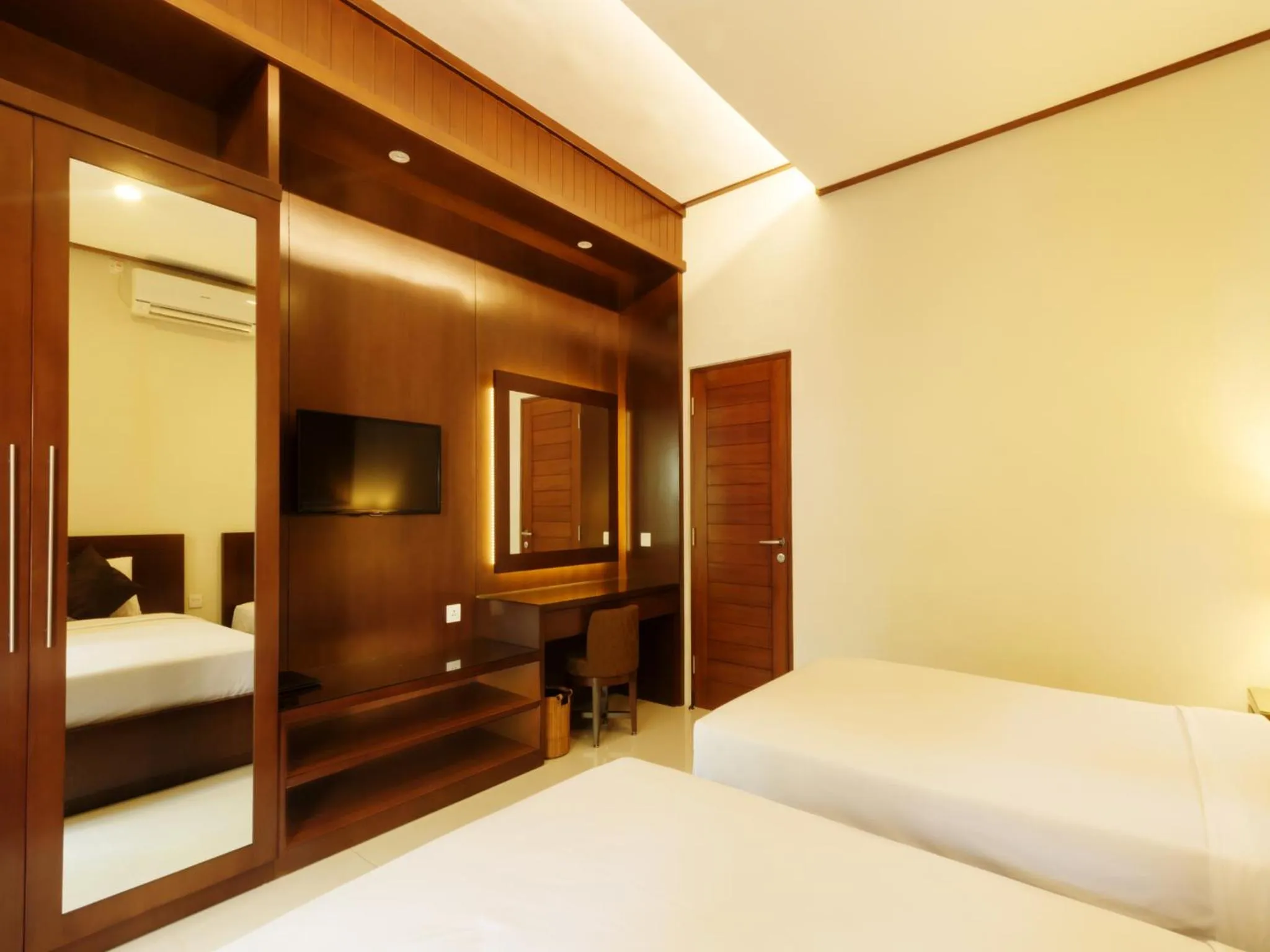 Photo of the whole room, Bed in Yulia Beach Inn Kuta