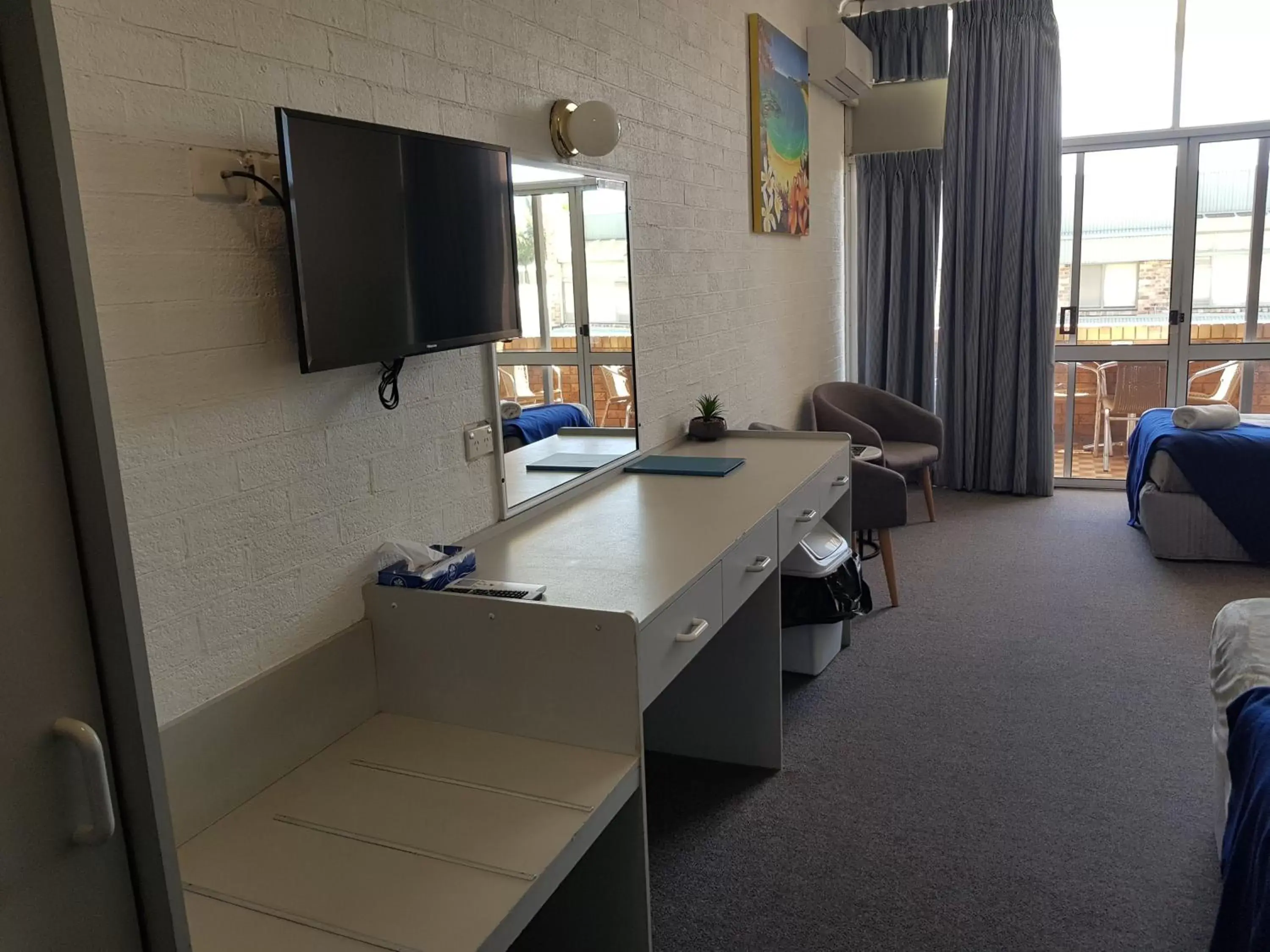 Photo of the whole room, TV/Entertainment Center in Seabreeze Beach Hotel