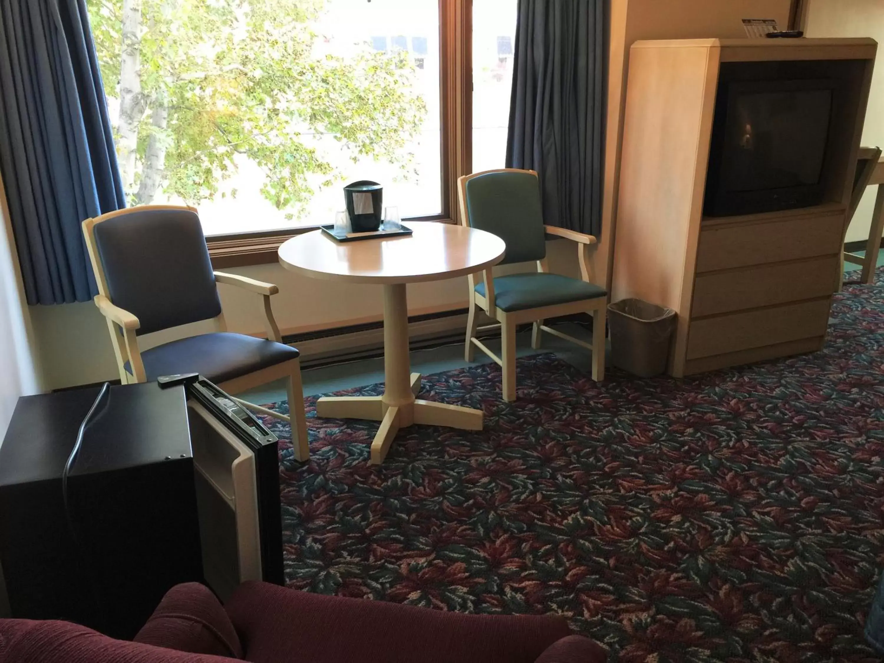 Seating area in Cedar Motor Inn