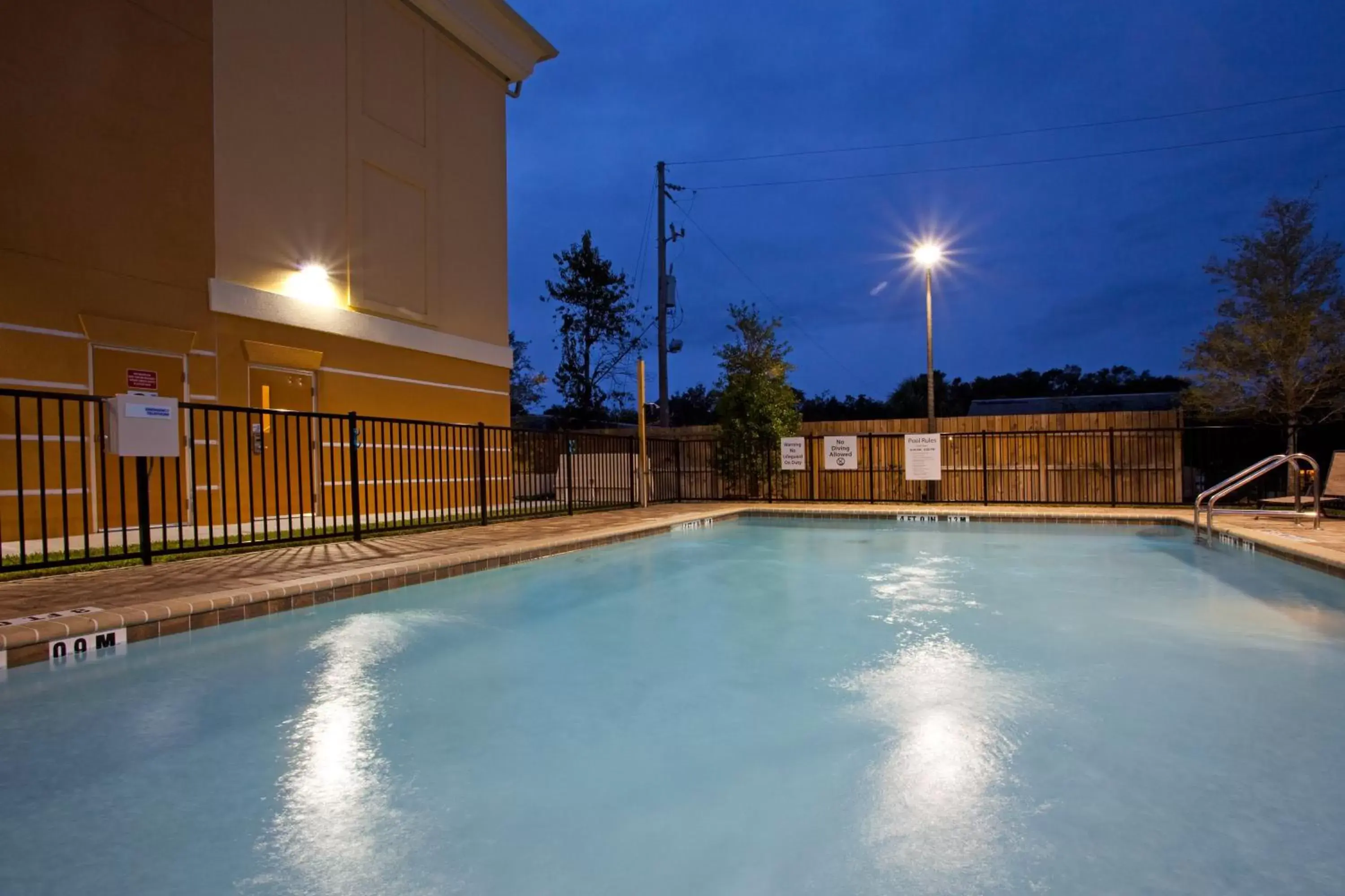 Swimming Pool in Holiday Inn Express Hotel & Suites Jacksonville - Mayport / Beach, an IHG Hotel