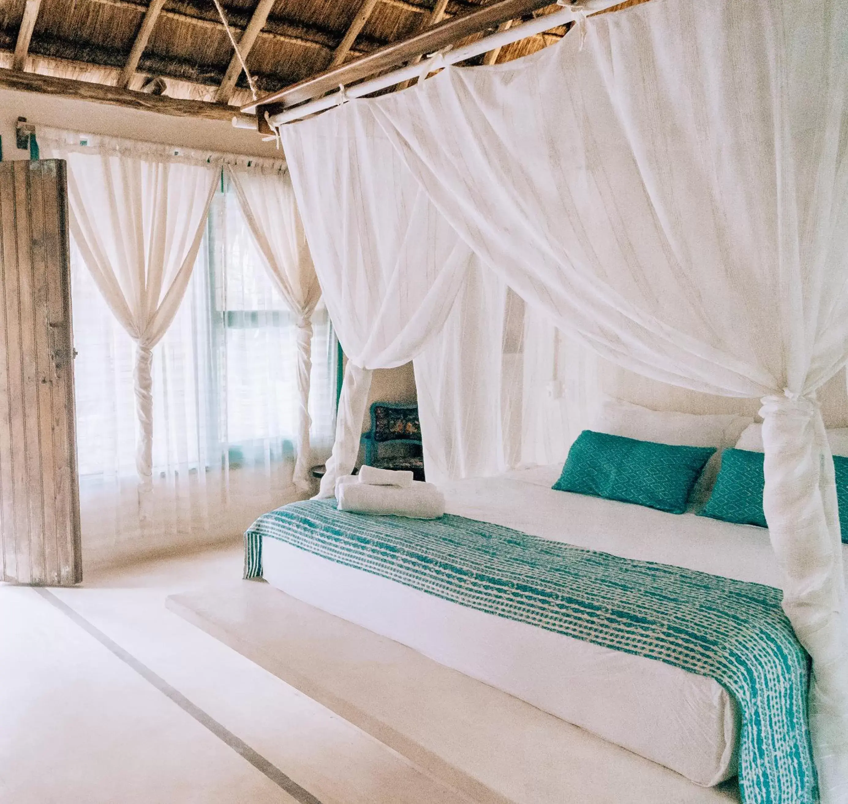 Photo of the whole room, Bed in Cormoran Boutique Hotel & Private Cenote Tulum