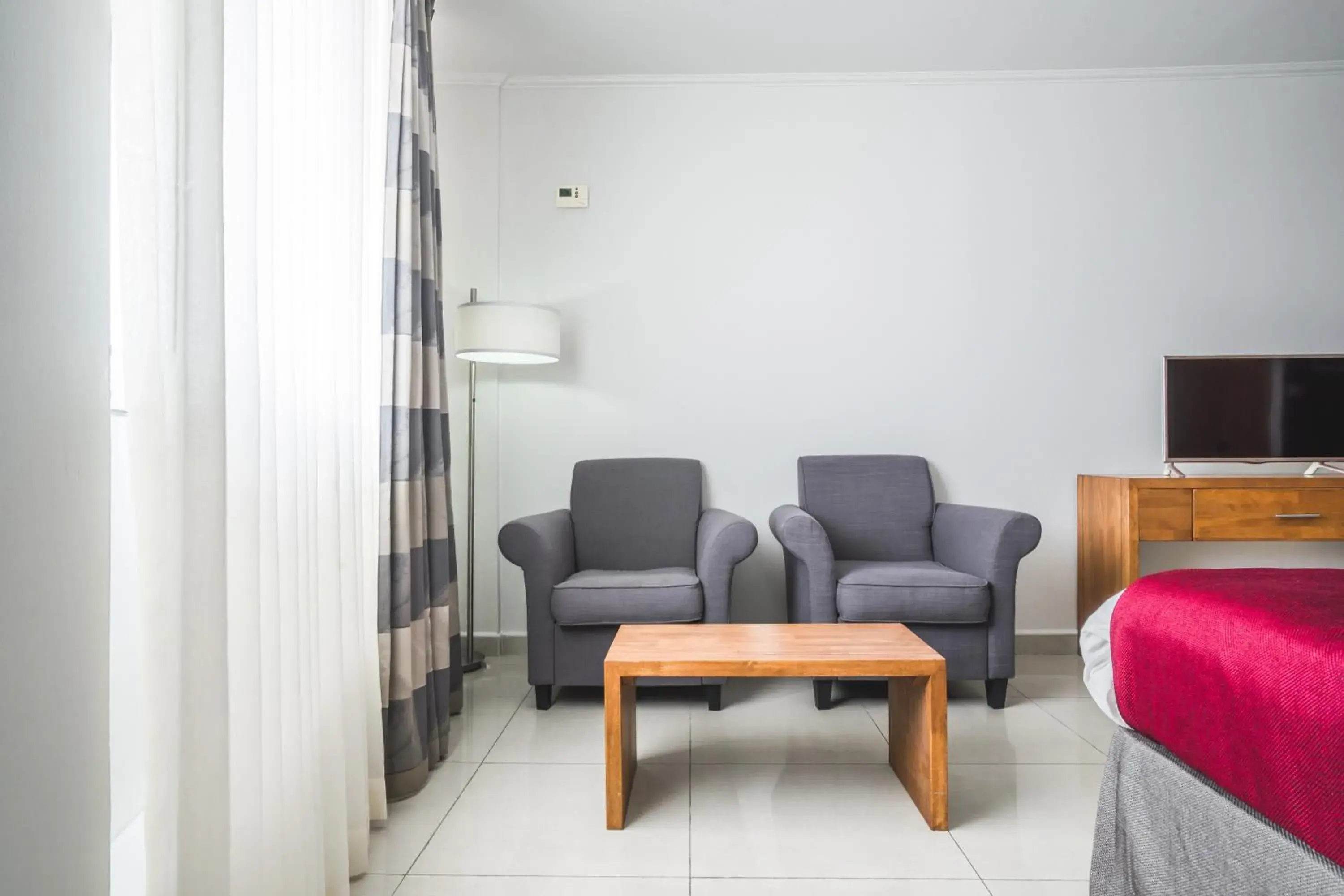 Seating Area in City Suites & Beach Hotel