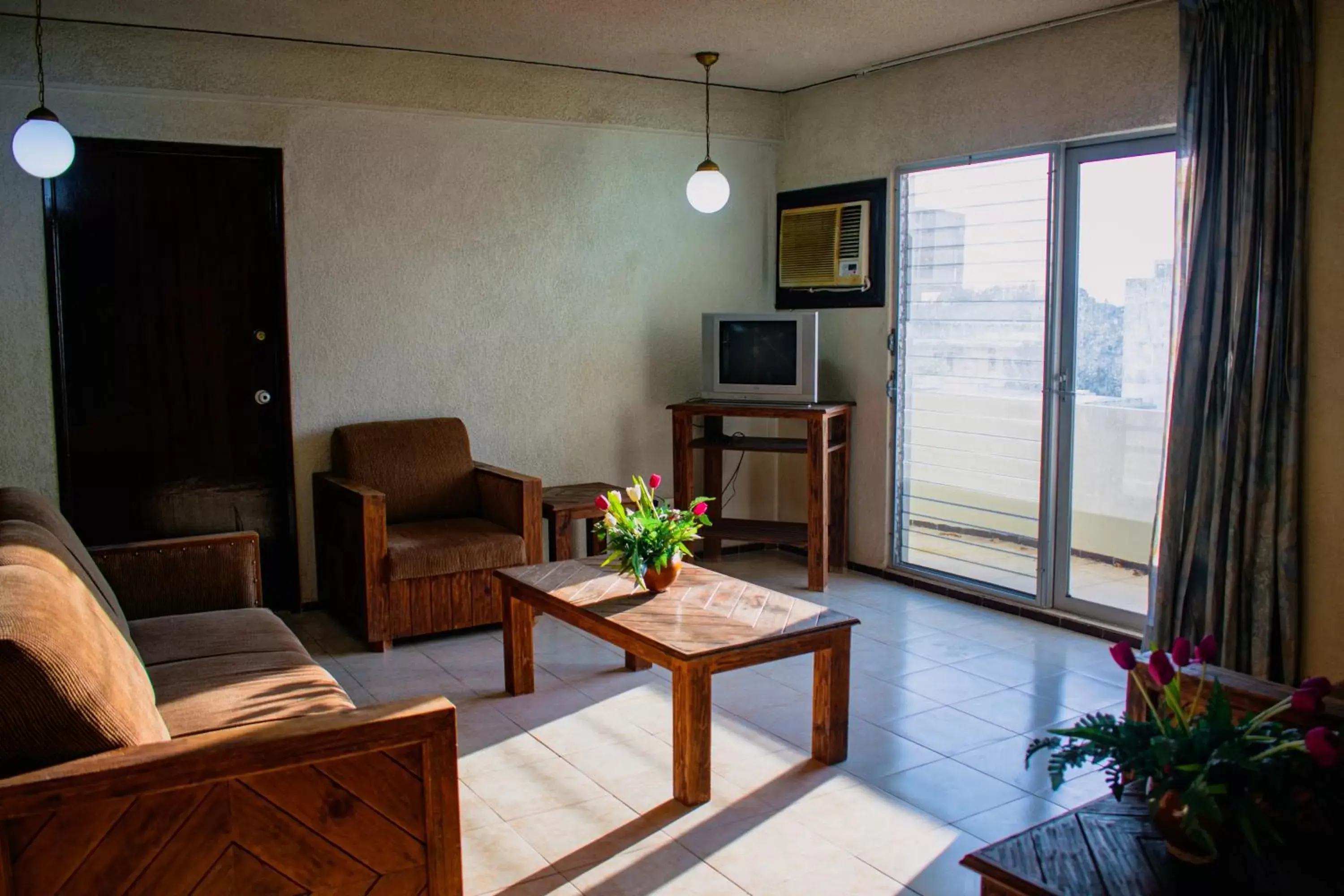 Living room, Seating Area in Suites Del Sol