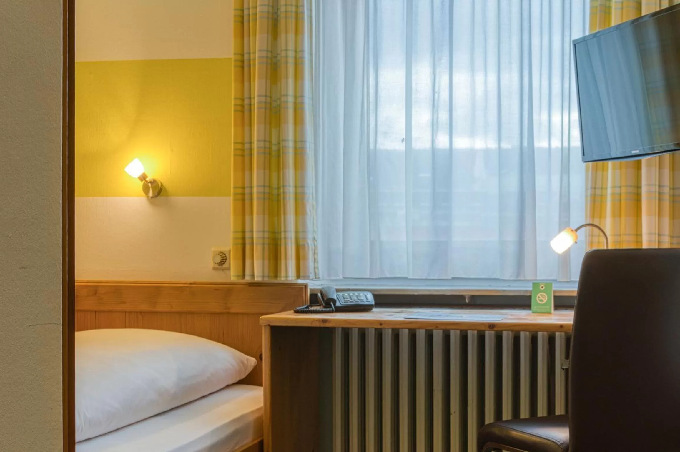 Photo of the whole room, Bed in Sautter Hotel Stuttgart City