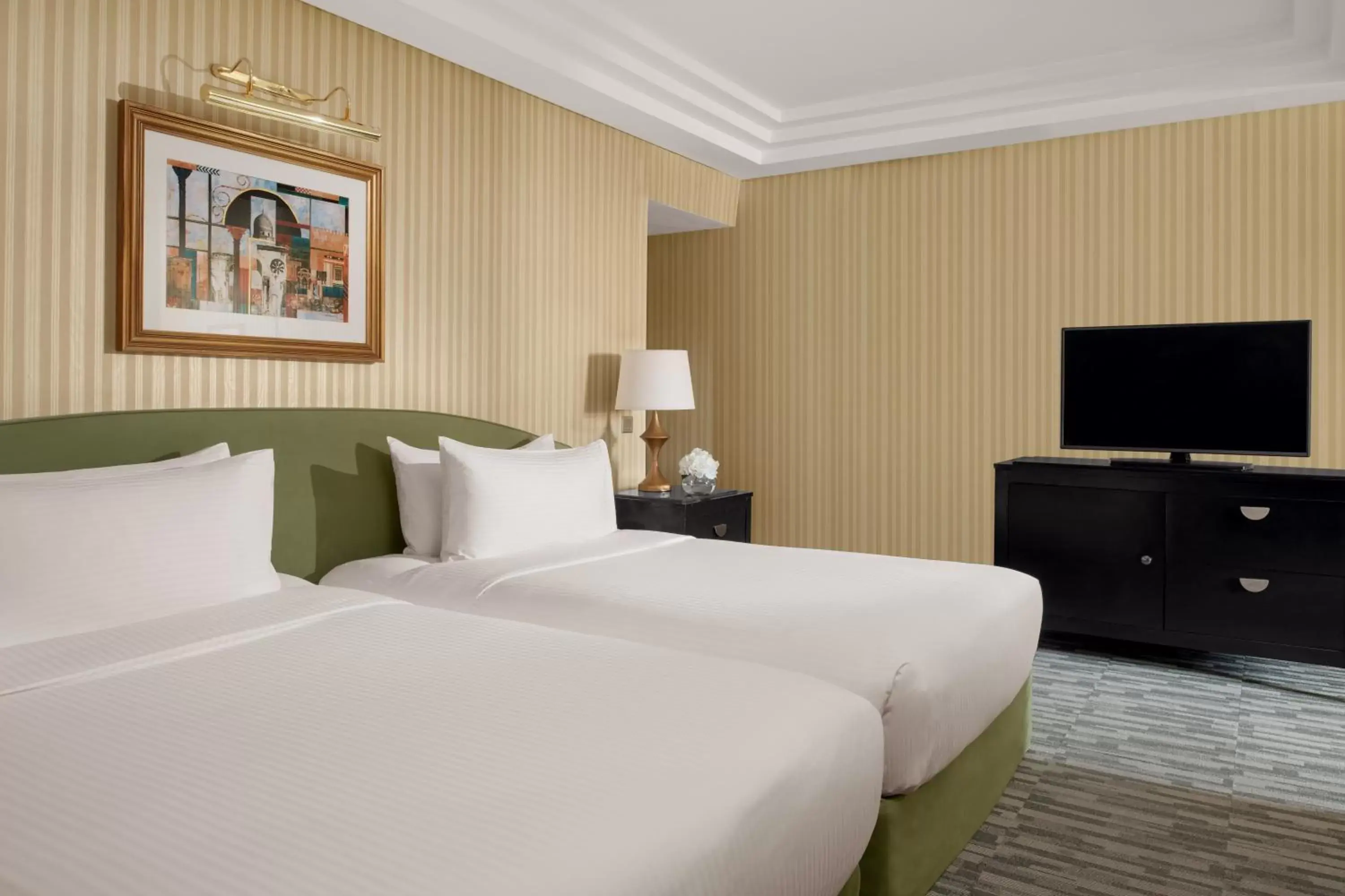 Communal lounge/ TV room, Bed in InterContinental Riyadh, an IHG Hotel Communal lounge/ TV room, Bed in InterContinental Riyadh, an IHG Hotel