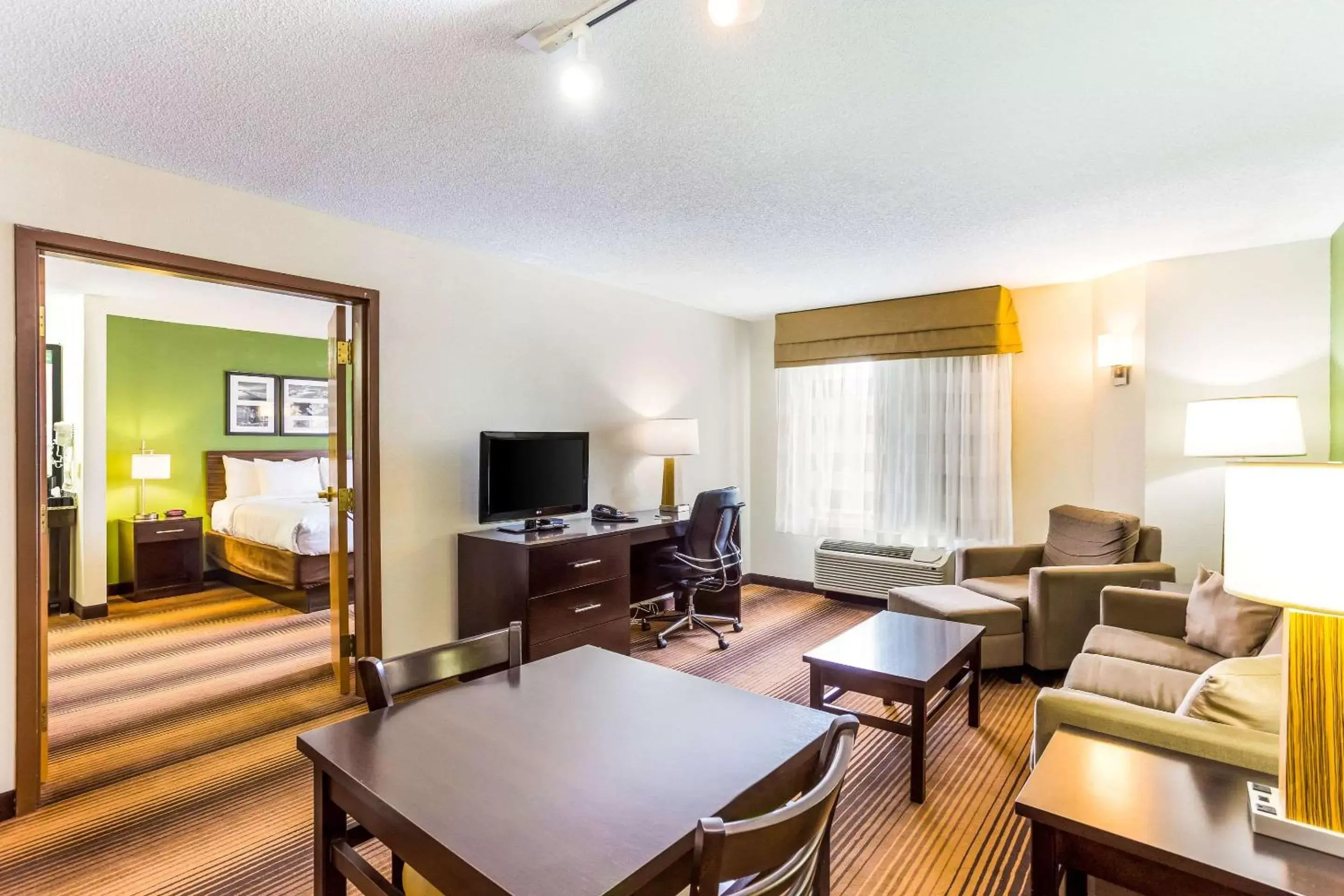 Photo of the whole room, TV/Entertainment Center in Sleep Inn & Suites Kingsport TriCities Airport