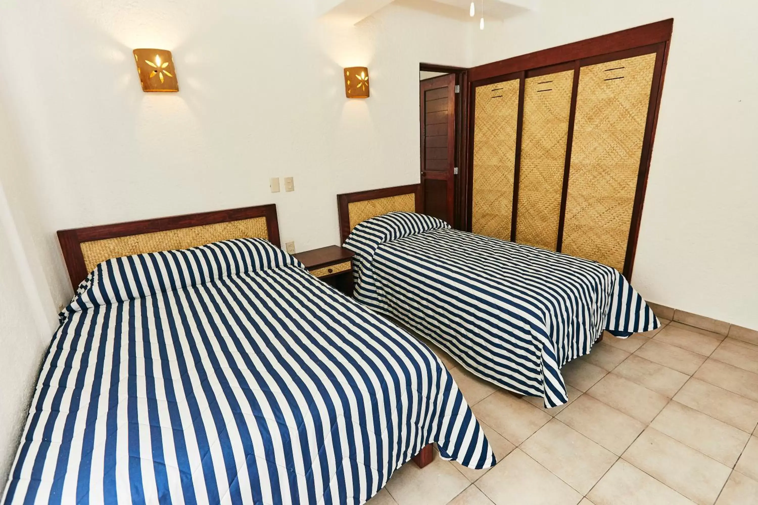 Bedroom, Bed in Hotel Suites Ixtapa Plaza