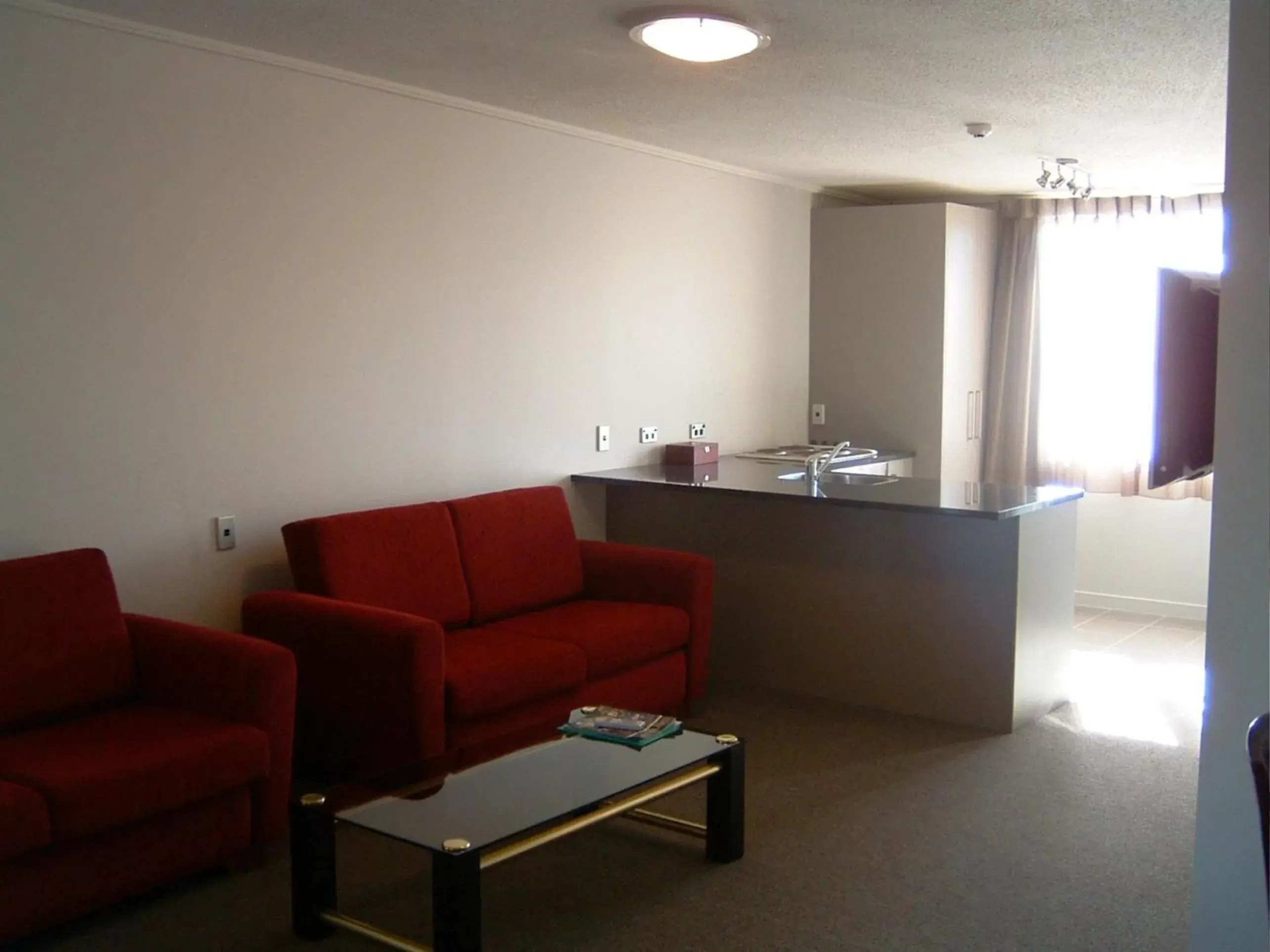 Living room, Seating Area in City Central Motel Apartments