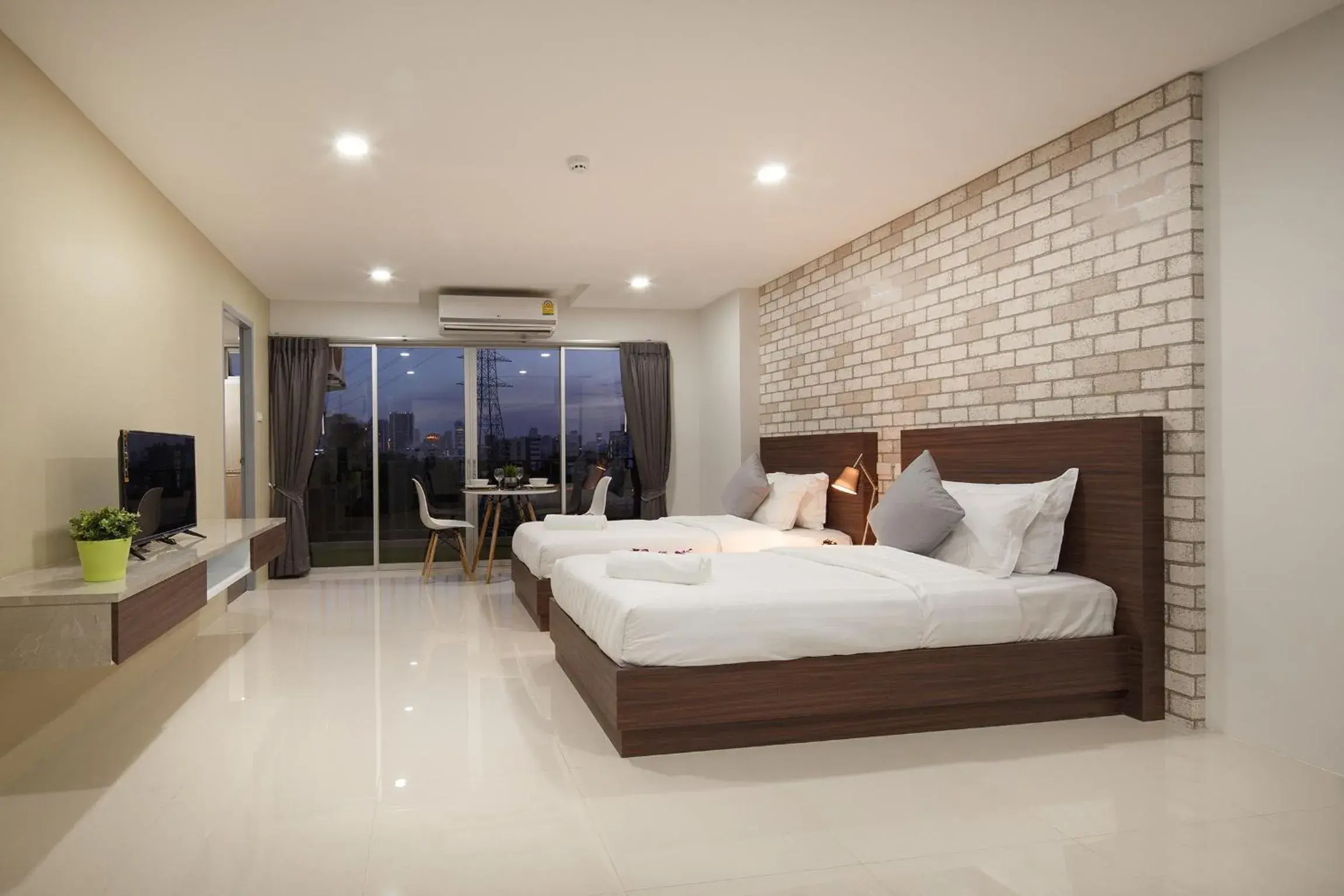 Bed in Q Space Residence