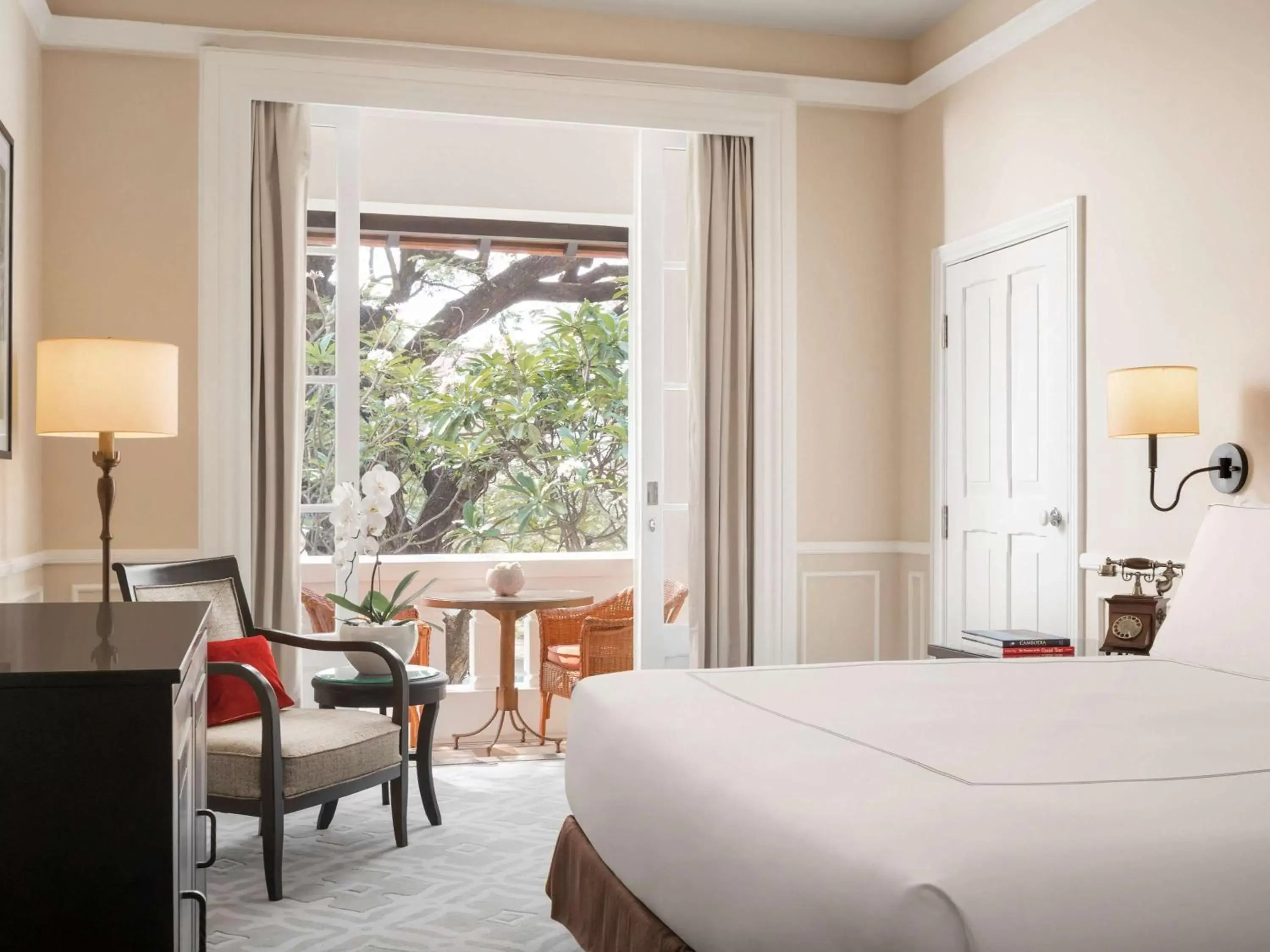 Photo of the whole room, Bed in Raffles Hotel Le Royal