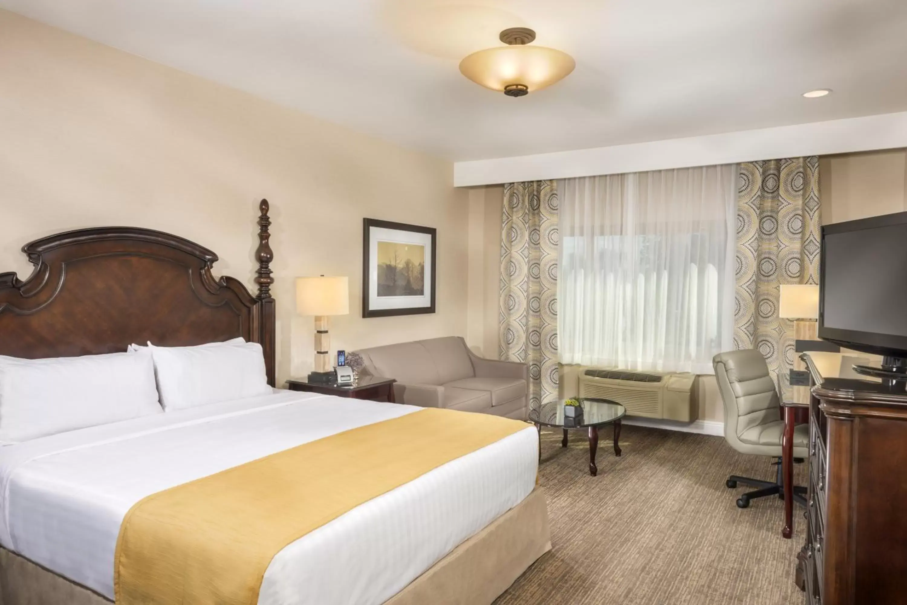 Photo of the whole room, Bed in Ayres Suites Ontario at the Mills Mall - Rancho Cucamonga