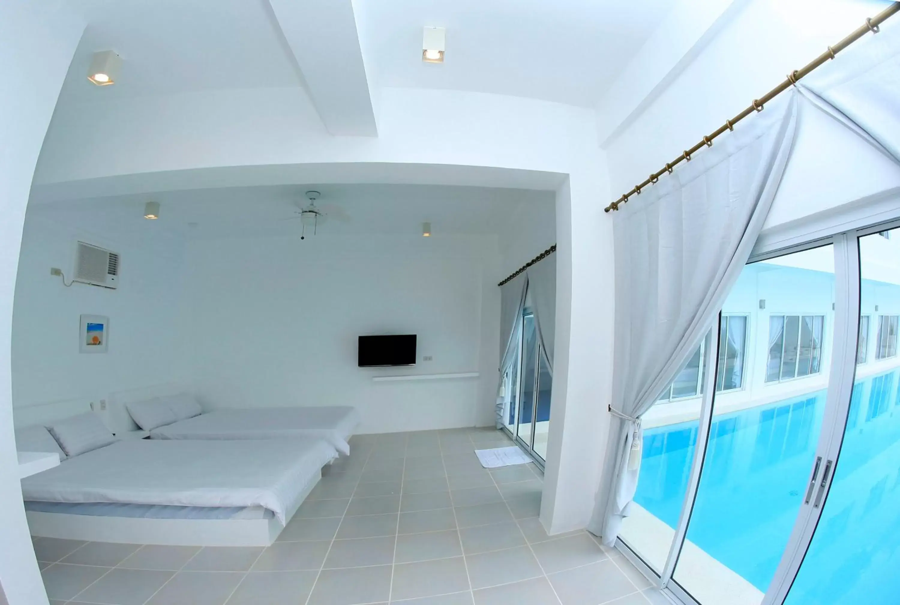 Living room, Swimming Pool in Bluewave Hotel